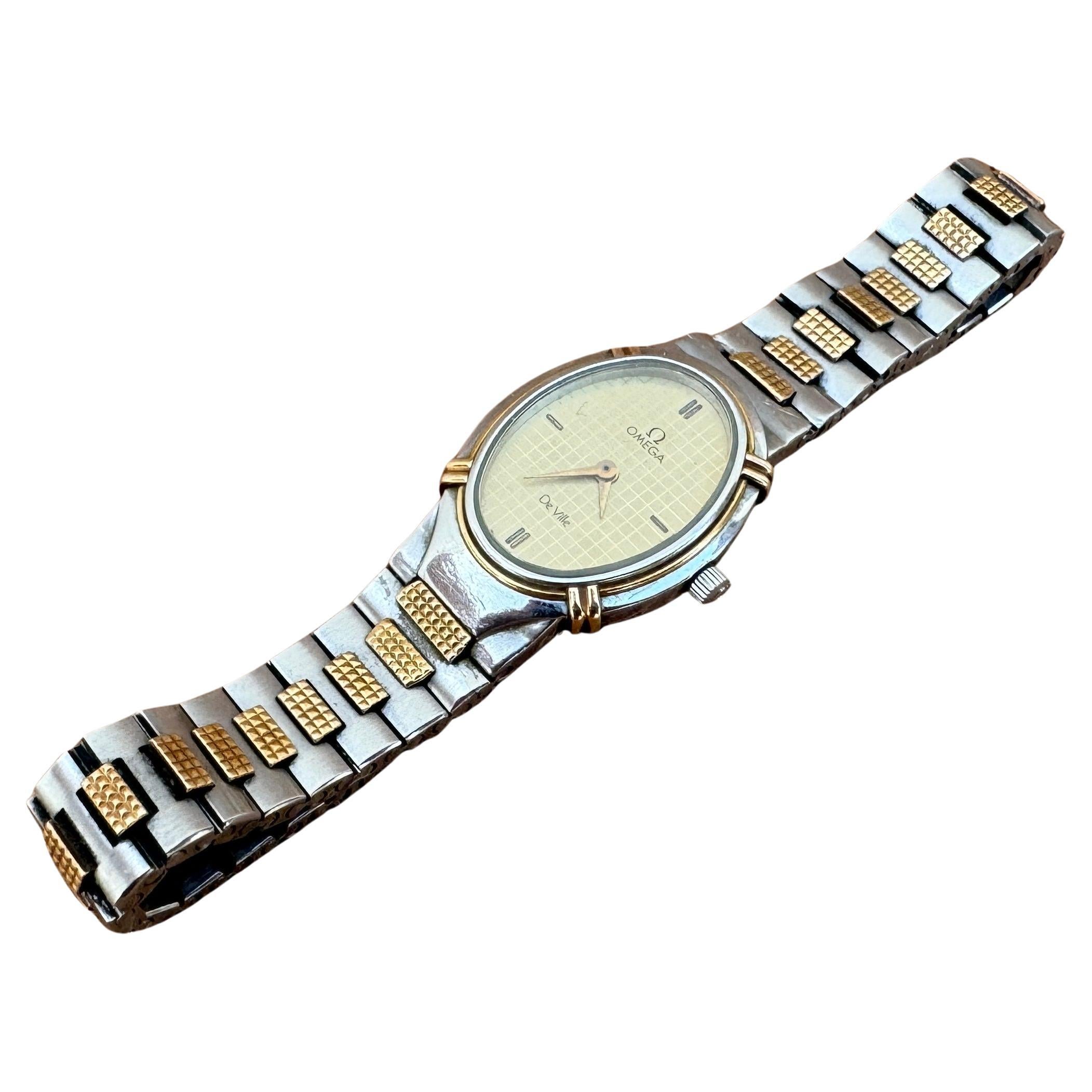 Omega De Ville 1450 Montre à cadran Quadri champagne doré en acier et or pour femmes