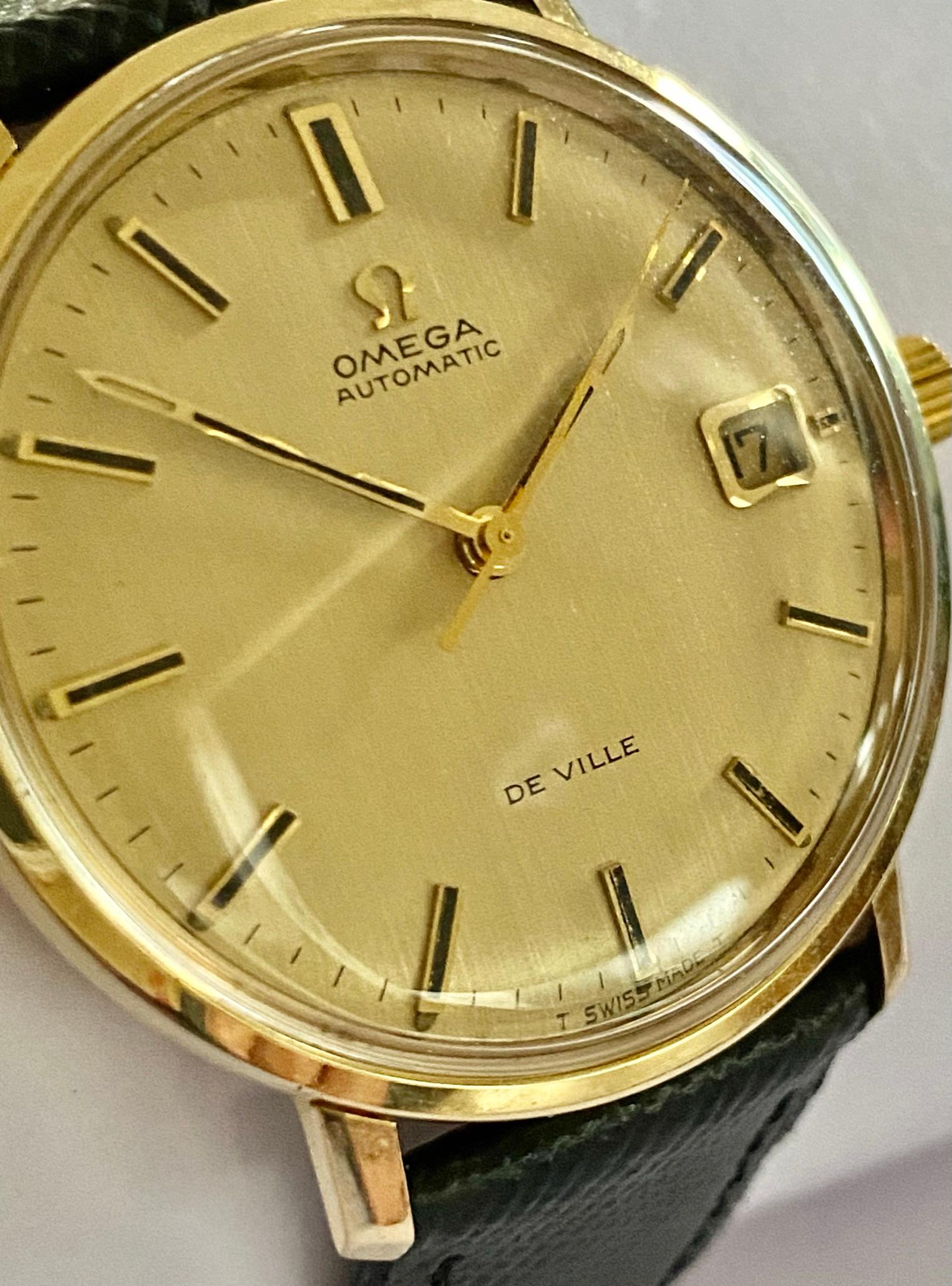 One (1) 14K. Yellow Gold Watch, Automatic Mouvement with Date
Brand: Omega, Line: De Ville  watch nr: BD 166.033
Mouvement nr: 32.963.899   Calibre: 565 ( automoatic, central seep-second hand, date)
Production:  april 17 1972
Sold in the Netherlands