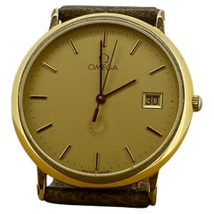 Reloj Omega De Ville chapado en oro S/acero Champán Esfera "Sol" c Fecha 32mm para caballero