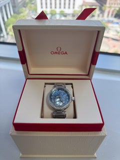 Omega De Ville Ladymatic Diamond Bezel and Blue MOP Dia Dial 425.30.34.20.57.003