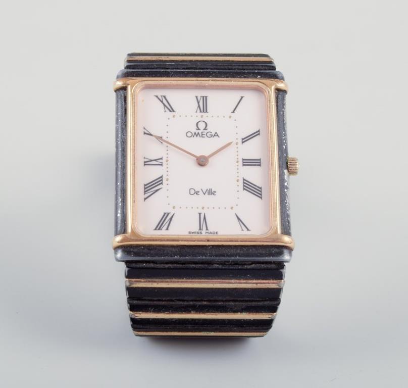 Omega De Ville men's wristwatch in brass and black metal. 1980s. en Excelente estado para la venta en bronshoj, DK