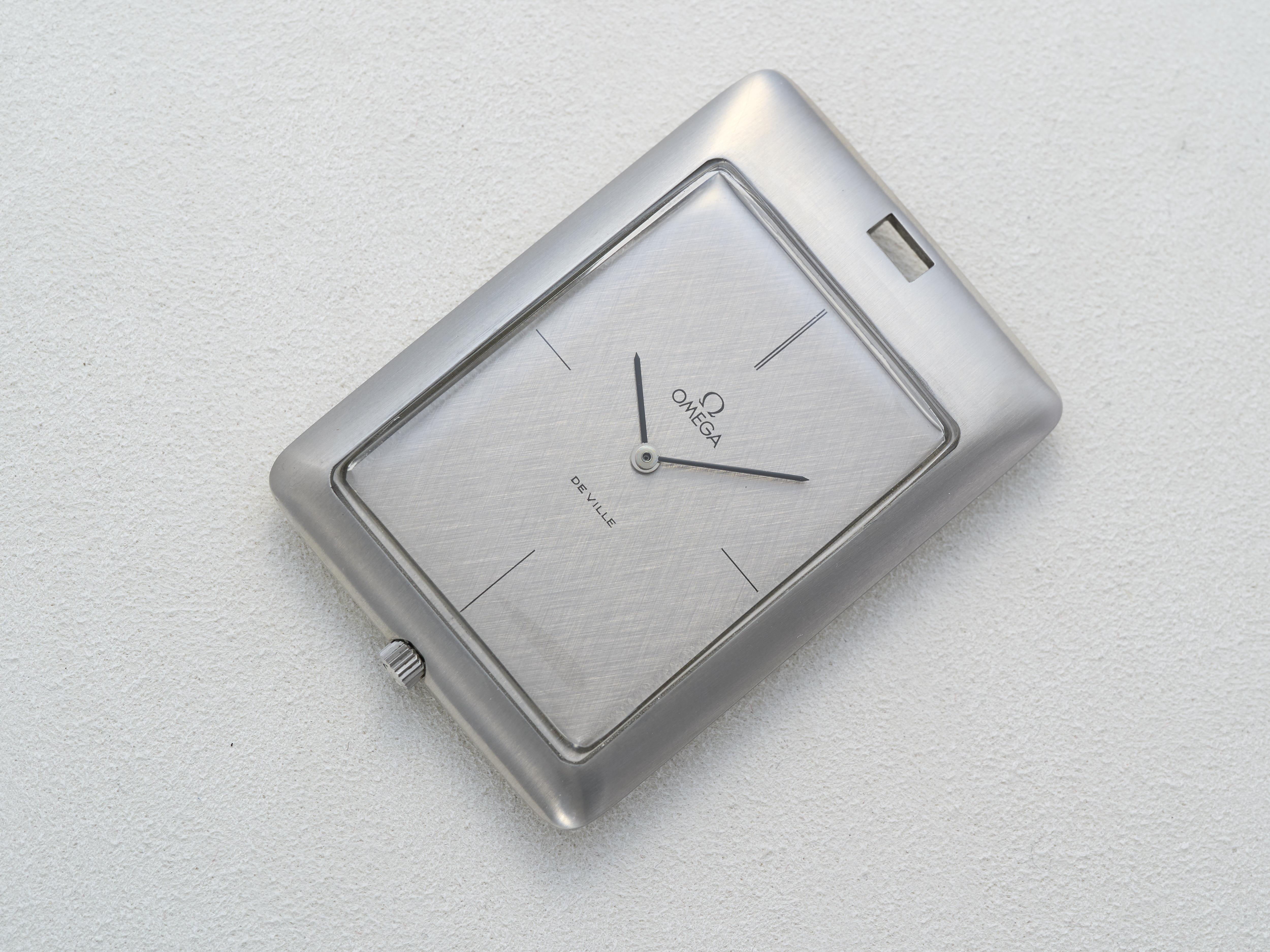 
Fork In Time is proud to offer on the 1st Dibs marketplace:

Omega 
De Ville 
Pocket Watch 

Reference 111,1738

Circa 1975

Art Deco Rectangular Design

Stainless Steel Case with Satin Finish

Grey Textured Dial with Baton markers

Manual Wind