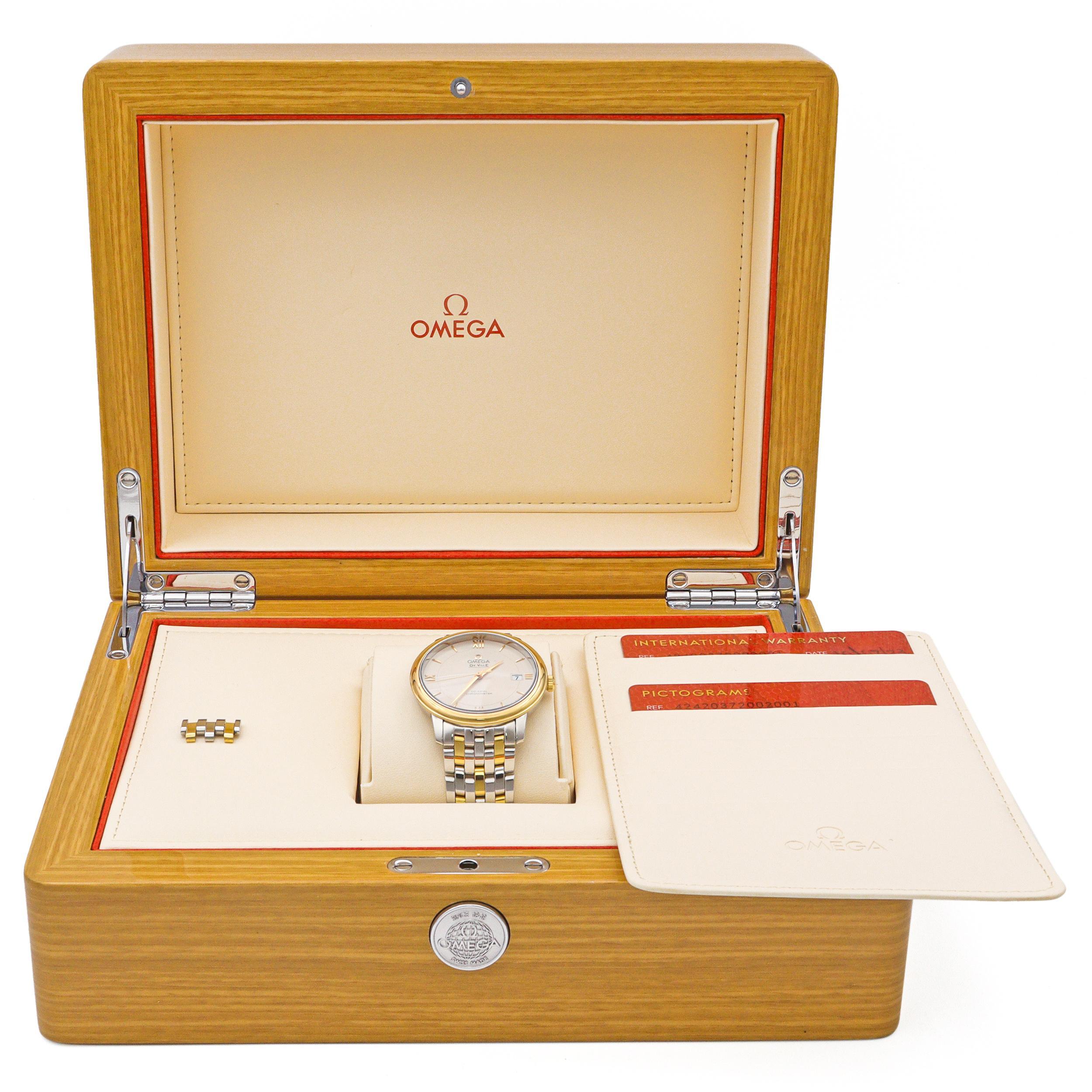 La sofisticación atemporal se une a la ingeniería de precisión en este Reloj Automático Omega De Ville Prestige para hombre. Con un refinado diseño bicolor, la caja y el brazalete combinan a la perfección el acero inoxidable con lujosos detalles en