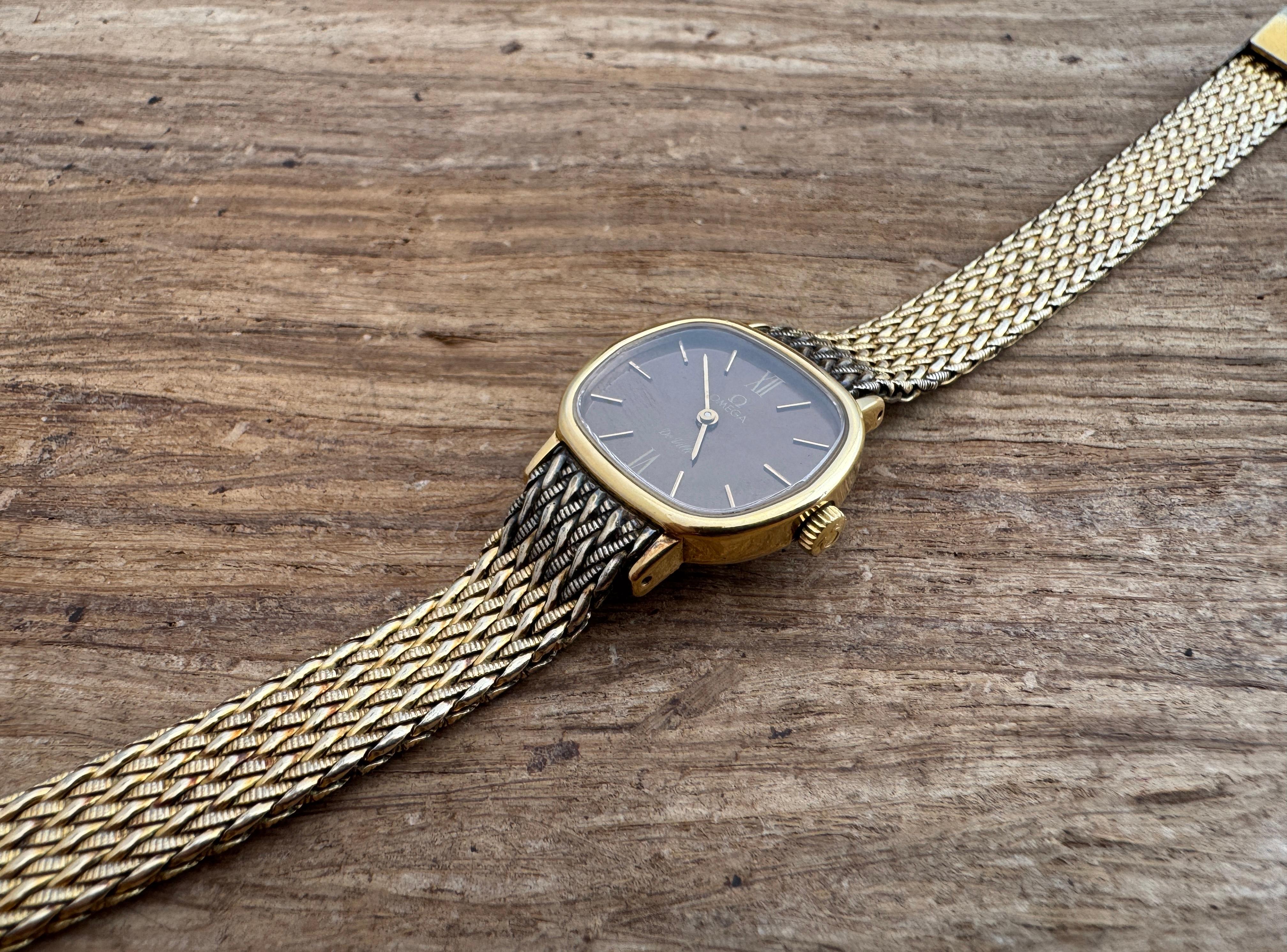 Brand : Omega

Model: De Ville

Reference Number: 5110561

Country Of Manufacture: Switzerland

Movement: Manual winding

Case Material: Gold Plated

Measurements :24 mm diameter (excluding crown )

Band Type : Gold Plated With Marked Buckle

Band