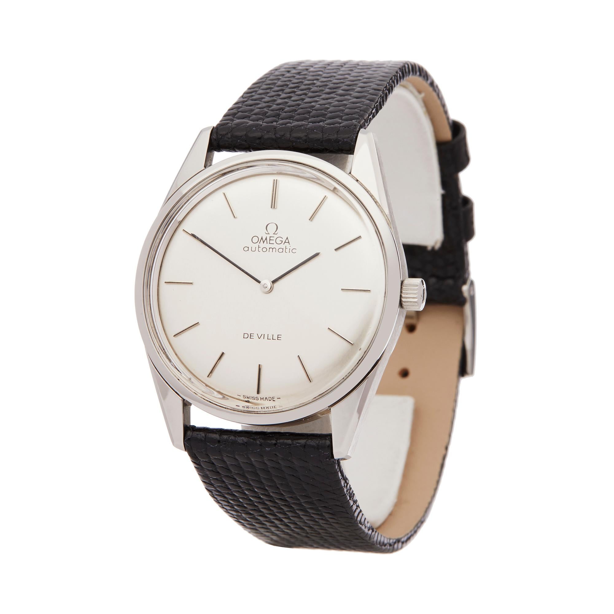 Reference: COM2130
Manufacturer: Omega
Model: De Ville
Model Reference: 1550019
Age: Circa 1973
Gender: Men's
Box and Papers: Original Omega Box Only
Dial: Silver Baton
Glass: Plexiglass
Movement: Automatic
Water Resistance: To Manufacturers