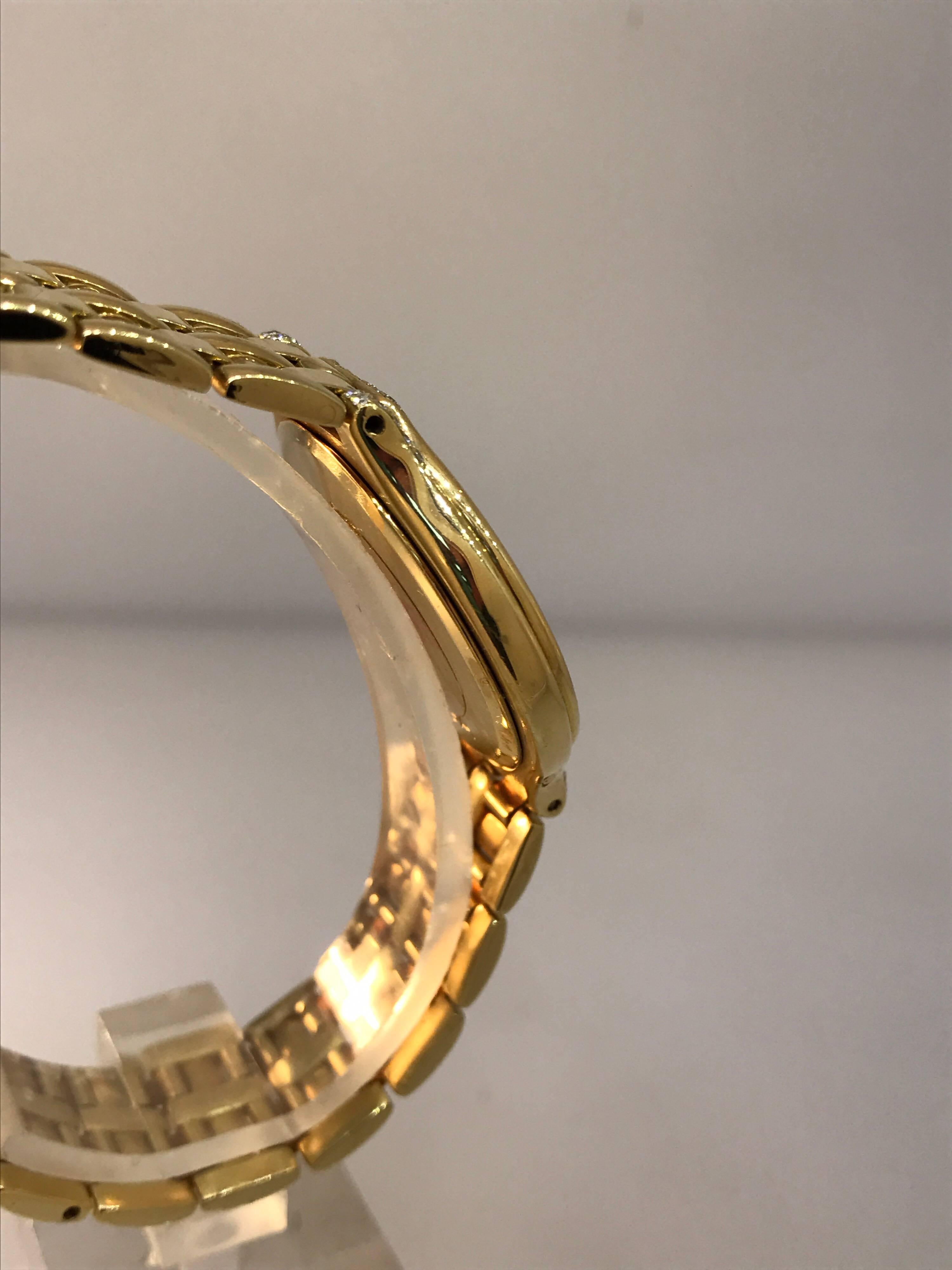 Omega Deville Yellow Gold and Diamond Date Display Bracelet Lady's Watch In Excellent Condition For Sale In New York, NY