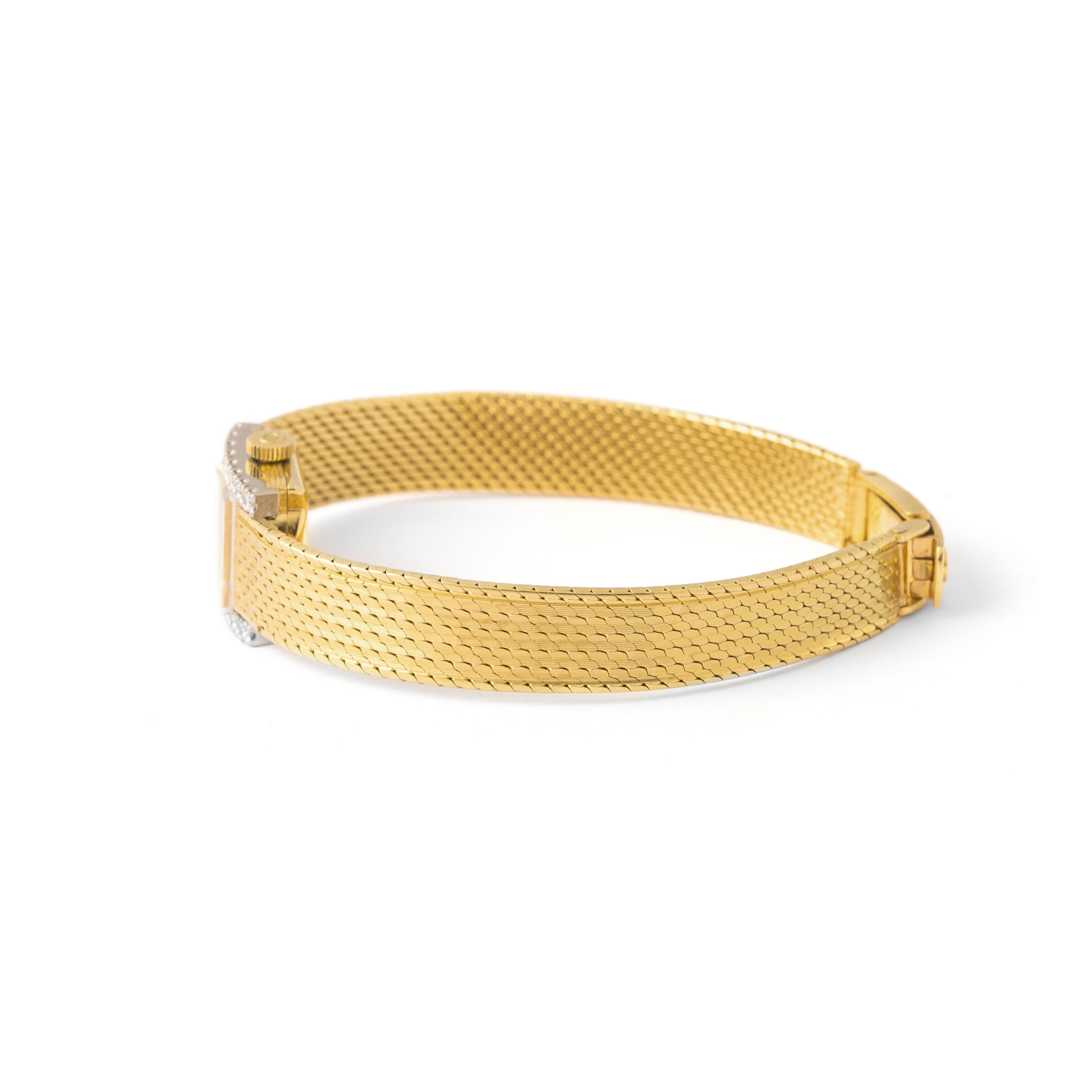 Montre-bracelet Omega en or jaune 18K avec diamants 1970S en vente 2