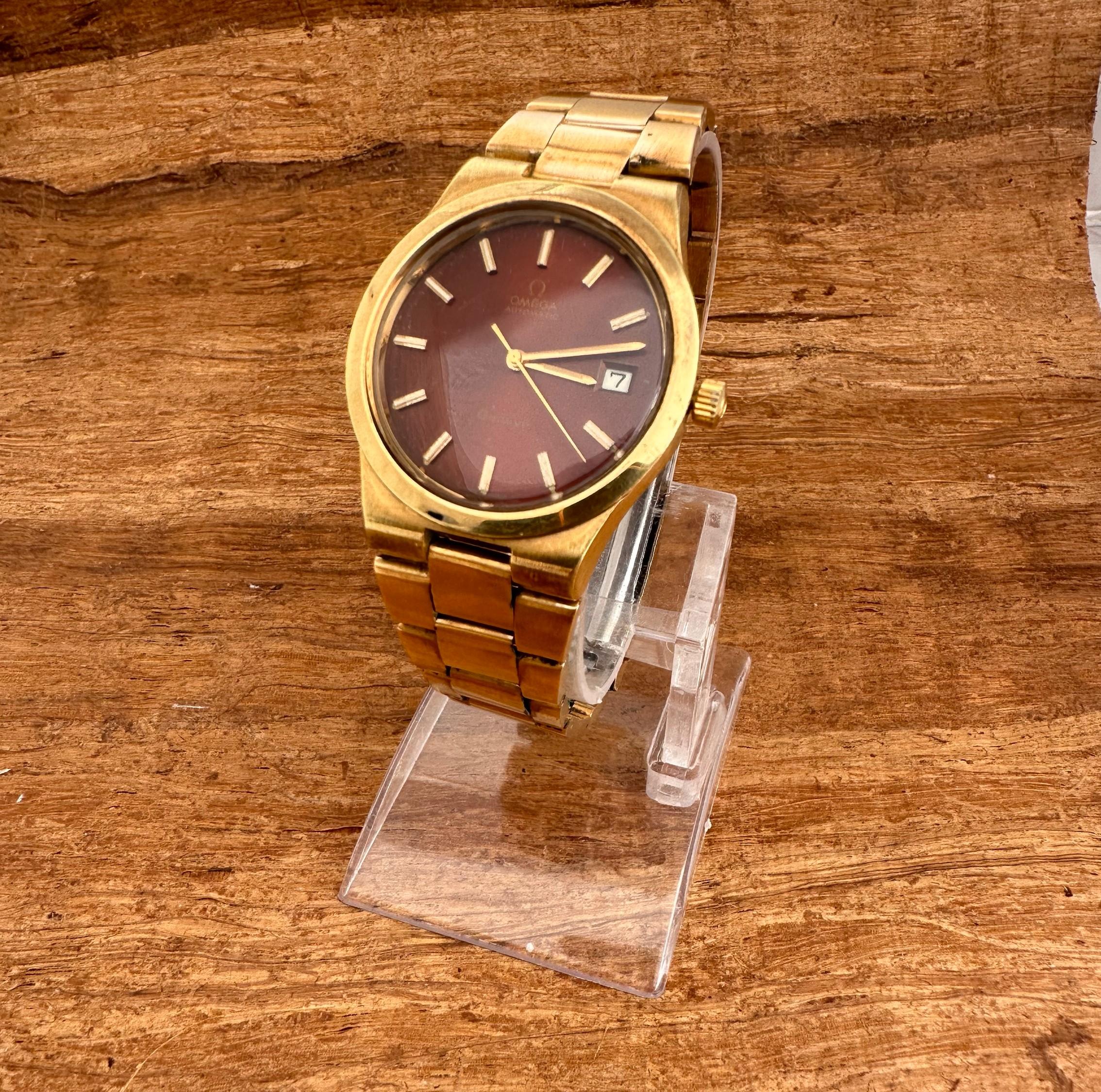   Descrizione
Marchio: Omega

Model: GENÈVE

Numero di riferimento: 1660174

Paese di produzione: Svizzera

Movimento: Automatico

Materiale della cassa: Acciaio inossidabile placcato oro

Misure : Larghezza cassa: 36 mm. (senza corona) x 43