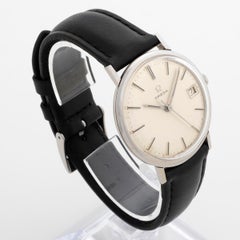 Omega Geneve avec date. Ref 132.019, Mouvement Cal 611, Patine, c1965