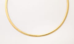 Collar de oro Omega