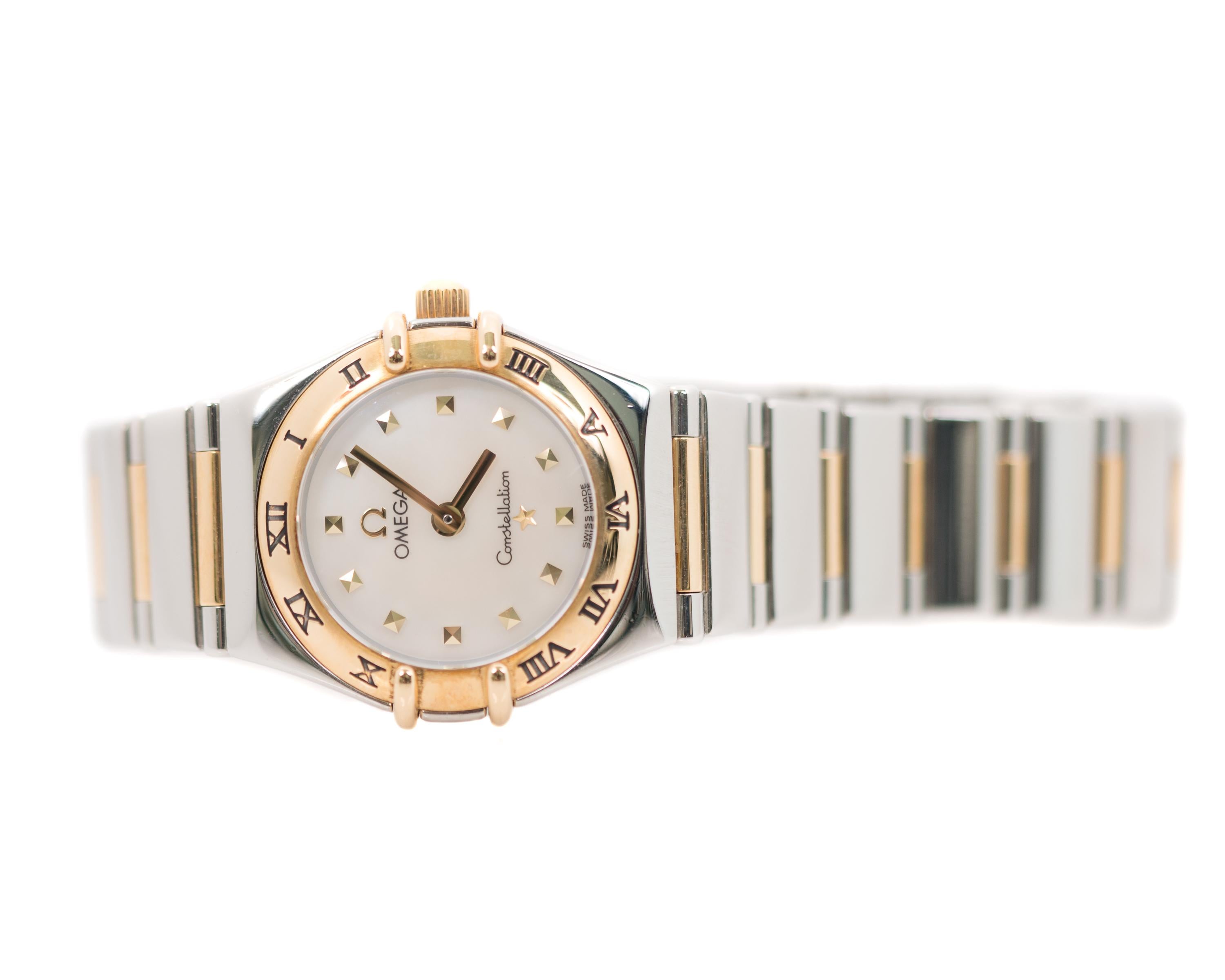 Omega Constellation Ladies Wrist Watch - 21 Karat Yellow Gold, Stainless Steel

Features:
Case diameter: 23 millimeters without crown, 25 millimeters with crown
Stainless Steel Case 
21 Karat Yellow Gold Bezel and Crown
Black Roman Numeral Hour