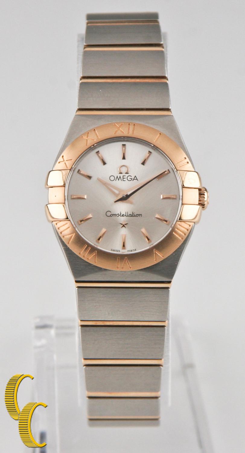 Model: Constellation 123.20.24.60.02.001
Stainless Steel Case w/ 18k Rose Gold (Red Gold) 24 MM
Crystal
Domed, Scratch resistant sapphire crystal thats anti reflective 
Dial
Silver with Rose/Red Gold Markers and Hands
Water Resistance 
100 meters or