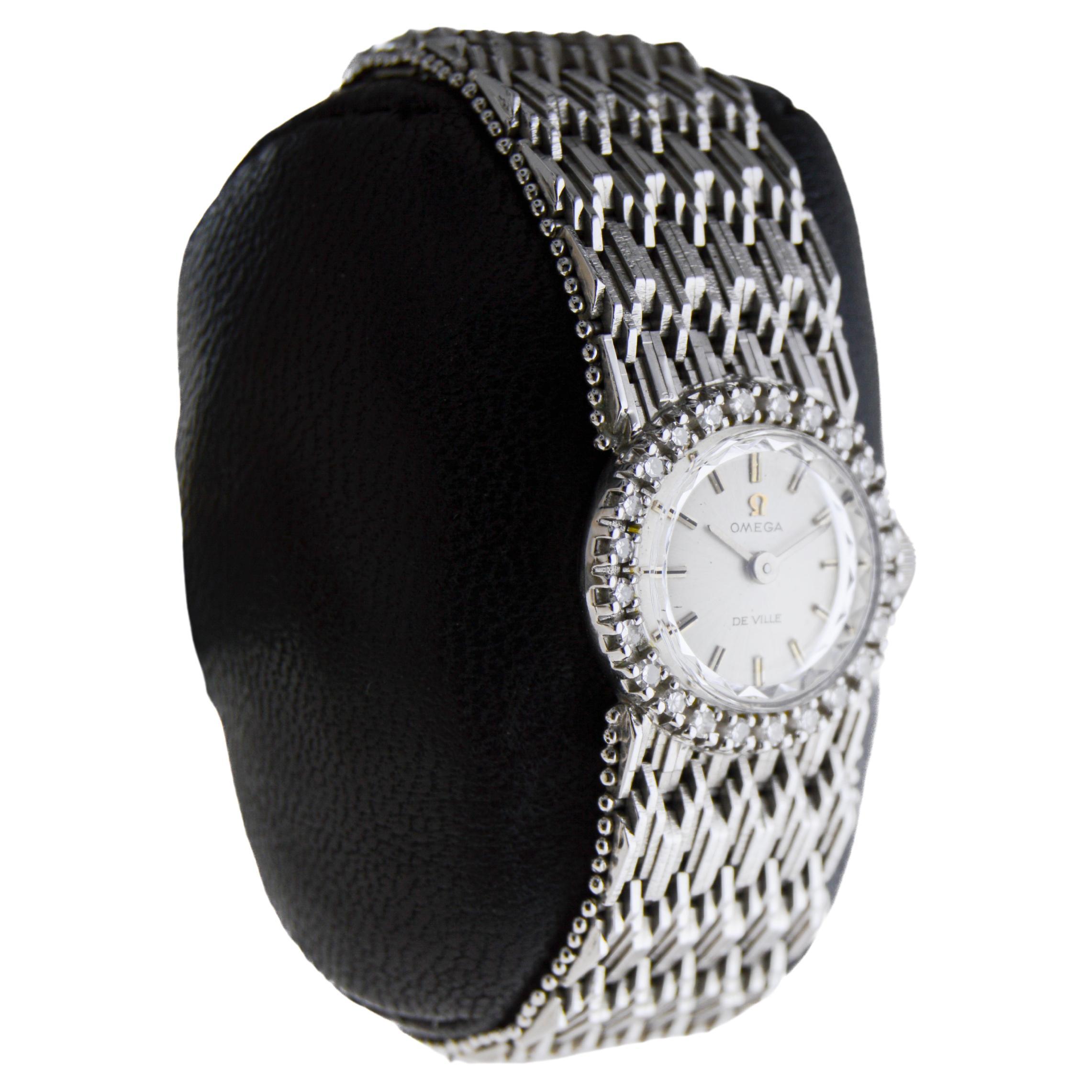 FACTORY / HOUSE: Omega Watch Company
STYLE / REFERENCE: Mid Century 
METAL / MATERIAL: 18Kt White Gold
CIRCA / YEAR: 1950's
DIMENSIONS / SIZE: 38mm Length X 36mm Diameter
MOVEMENT / CALIBER: Manual Winding / 17 Jewels 
DIAL / HANDS: Original