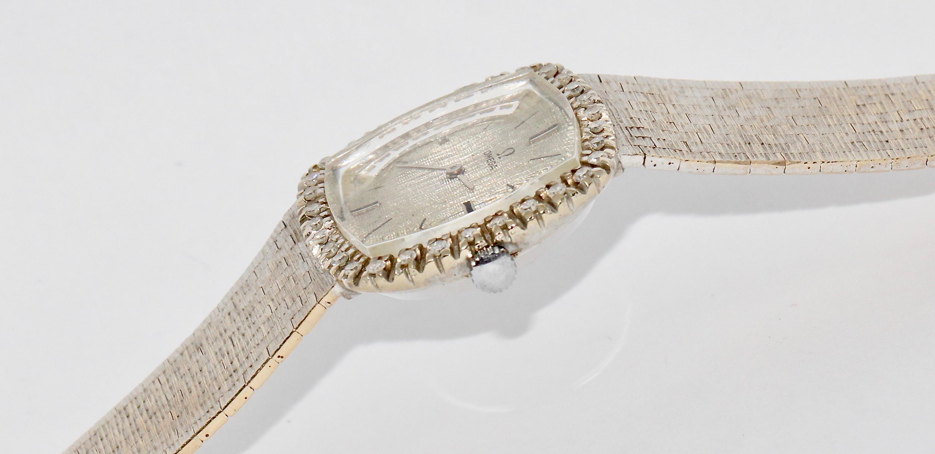 omega women's gold watch with diamonds
