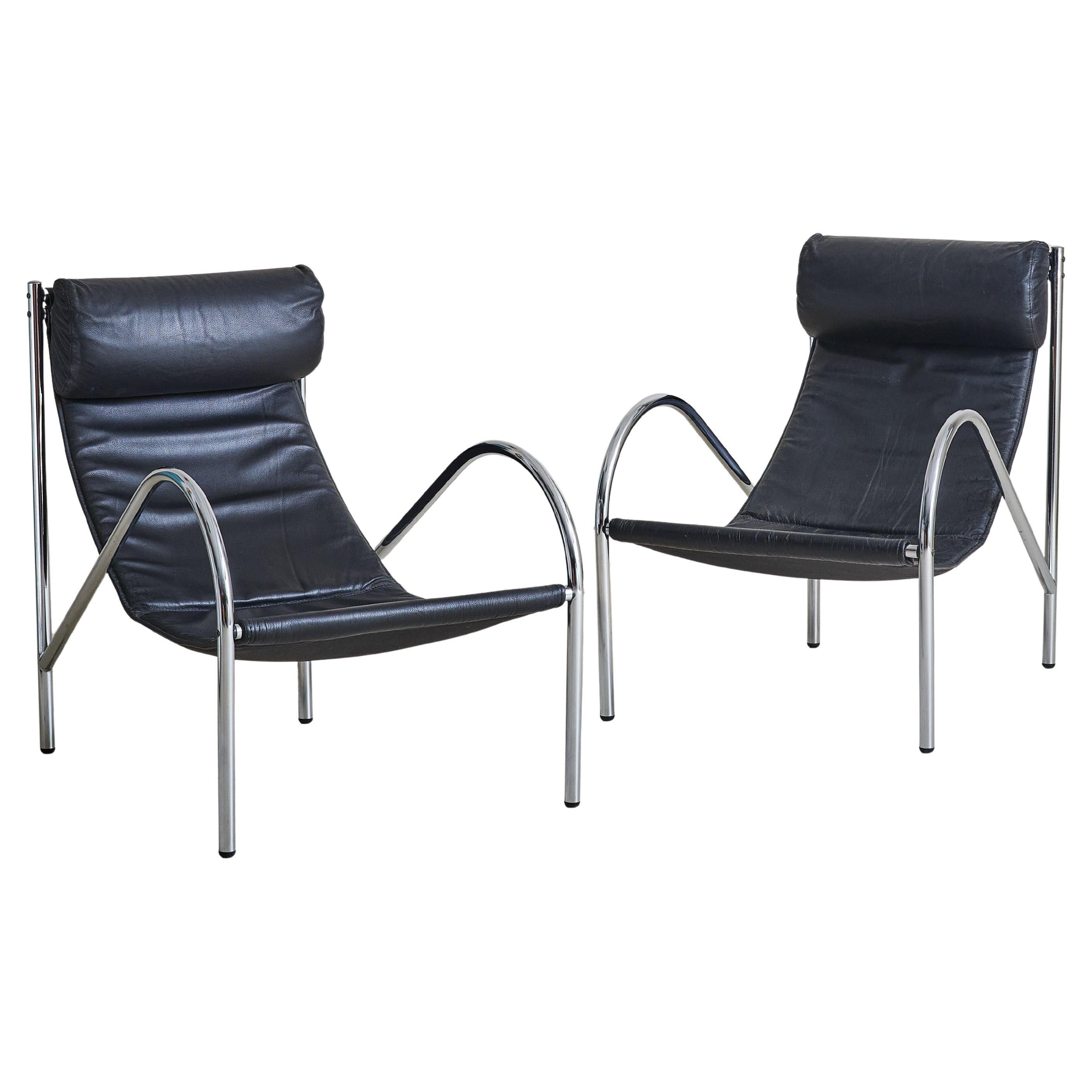Sold and priced individually.  One available/one sold.

A striking ‘Omega’ armchair by Habitat, this iconic design was crafted in England between 1985 and 1997. Defined by a sleek tubular chrome frame, the chair features a soft black leather sling