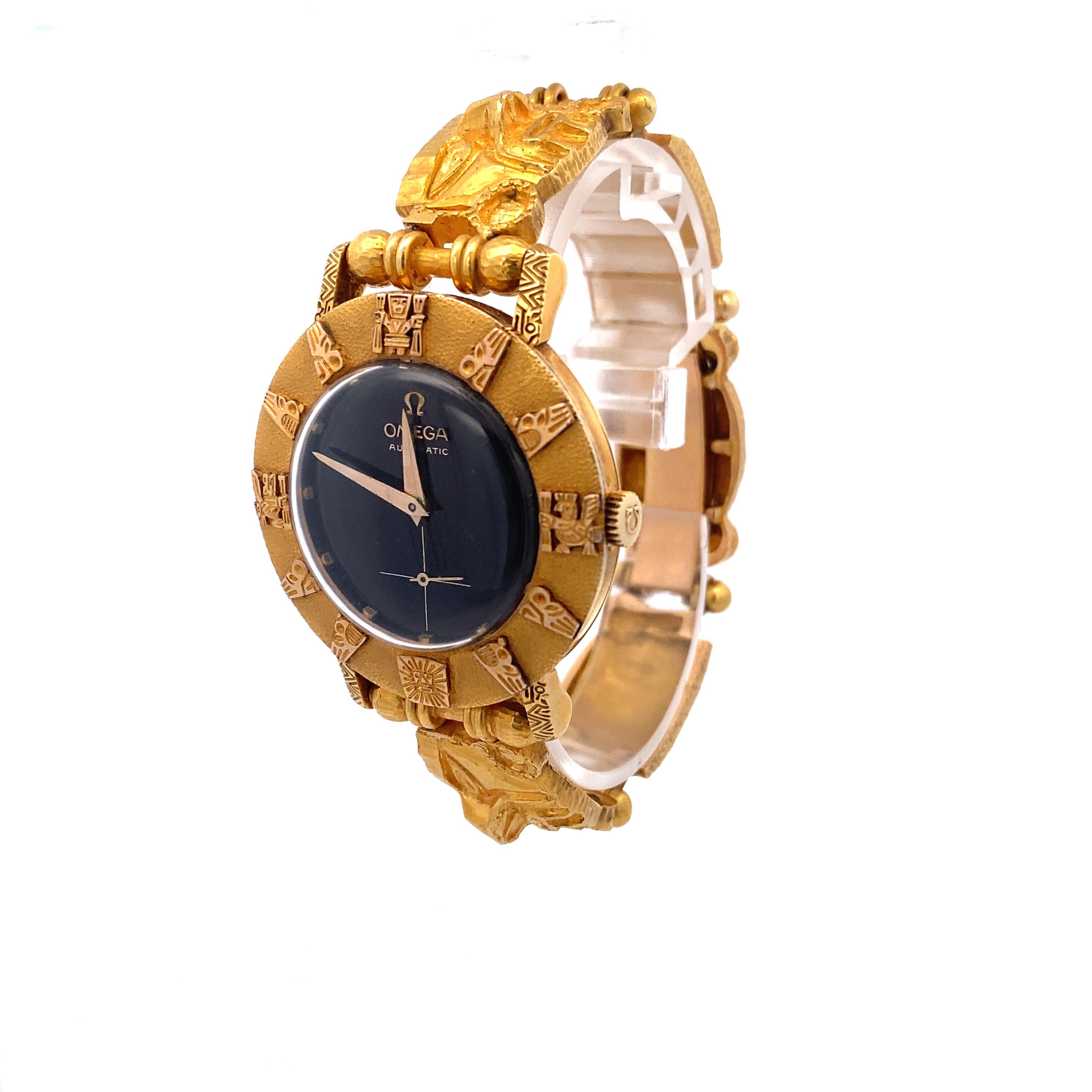 Introducing the exquisite Omega Mechanical Watch with Custom Made Solid 18k Gold Peruvian Moche Case and Bracelet, a true masterpiece in the world of luxury watches. This vintage, circa 1960-70's watch, was crafted with precision and care, this
