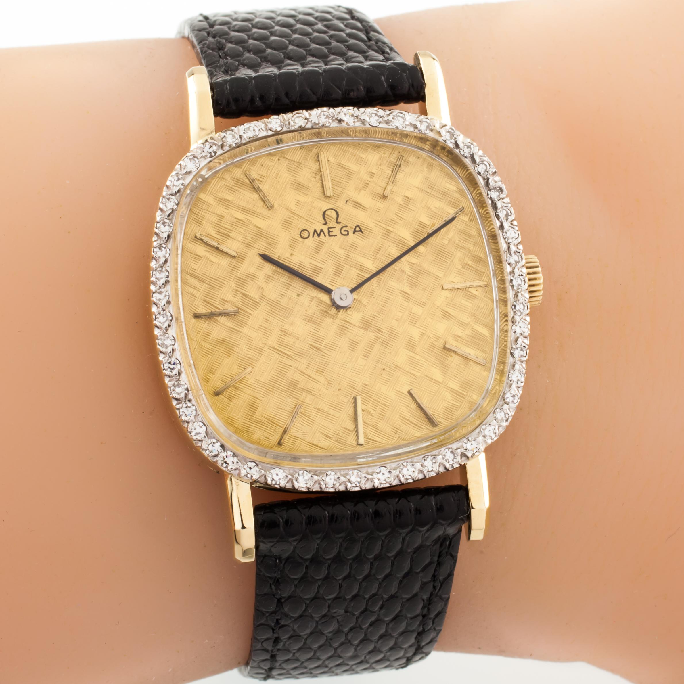 Omega Men's 14k Yellow Gold Hand-Winding Watch w/ Diamond Bezel Leather Band
Model: DeVille Dress Watch
Model #DD6817
Case Serial #261175
Movement #625
Movement Serial #328085
14k Yellow Gold Case w/ Diamond Bezel
29 mm Wide (30 mm w/ Crown)
30 mm