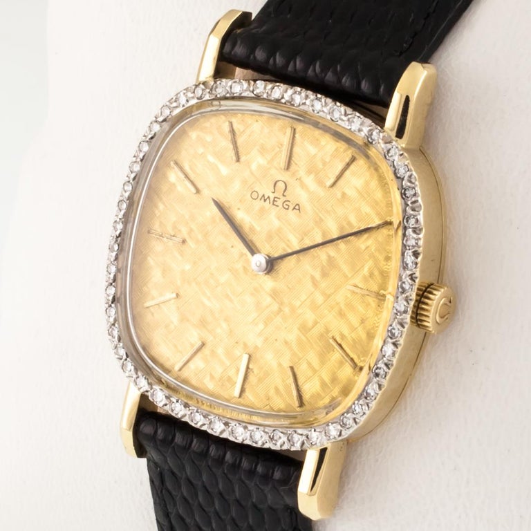 Omega Men's 14 Karat Gold HandWinding Watch with Diamond Bezel Leather
