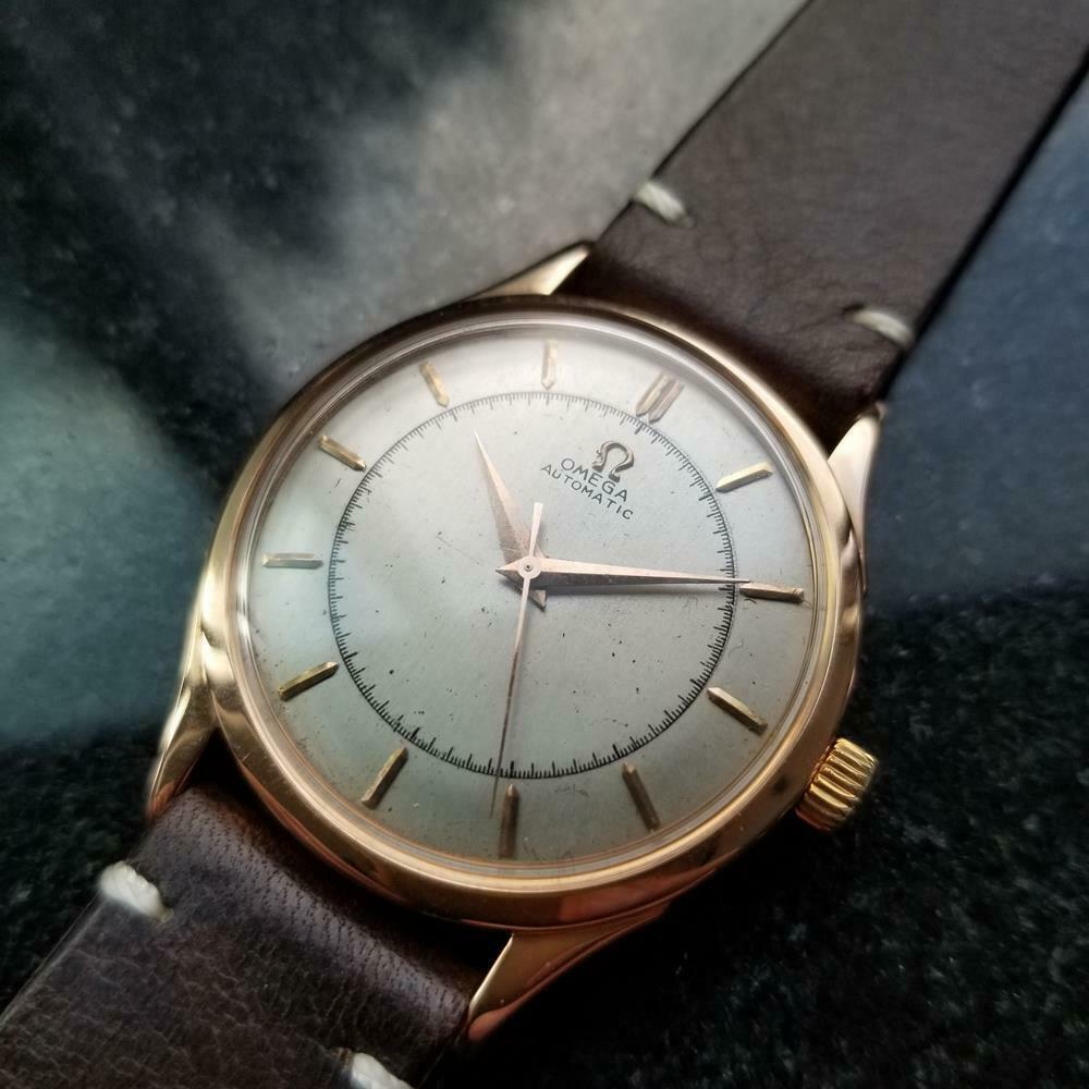 Vintage luxury, men's 18k solid rose gold Omega 2584 bumper automatic, c.1947. Verified authentic by a master watchmaker. Gorgeous aged silver Omega dial, applied indice hour markers, gilt minute and hour hands, central sweeping second hand, hands