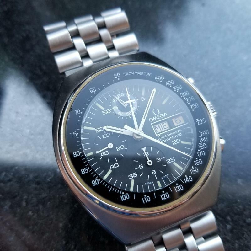 Sporty Luxury, men's Omega Speedmaster Mark 4.5 automatic 42mm, c.1978, all original. Verified authentic by a master watchmaker. Black Omega chronograph dial, applied white baton hour markers, white minute and hour hands, sweeping central second