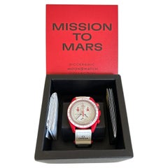 Omega Moonswatch 'Mission to Mars' Armbanduhr. Neu, Ungetragen, Aufgeklebt