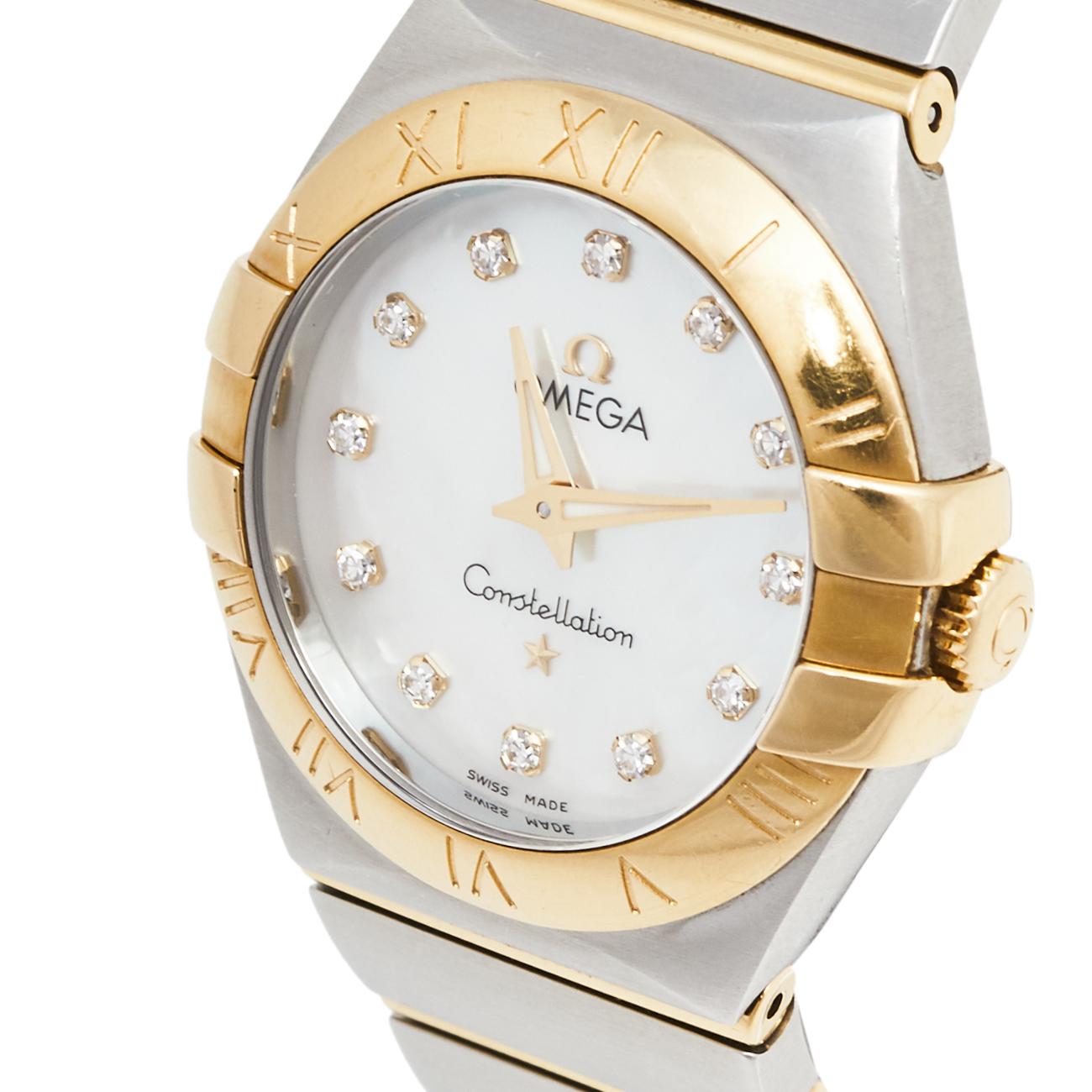 An icon from Omega, this Constellation Quartz watch for women is cast in stainless steel and 18 yellow gold. It has Roman numerals engraved on the bezel and a mother of pearl dial that holds our gaze. Set on the round dial are three gold hands and