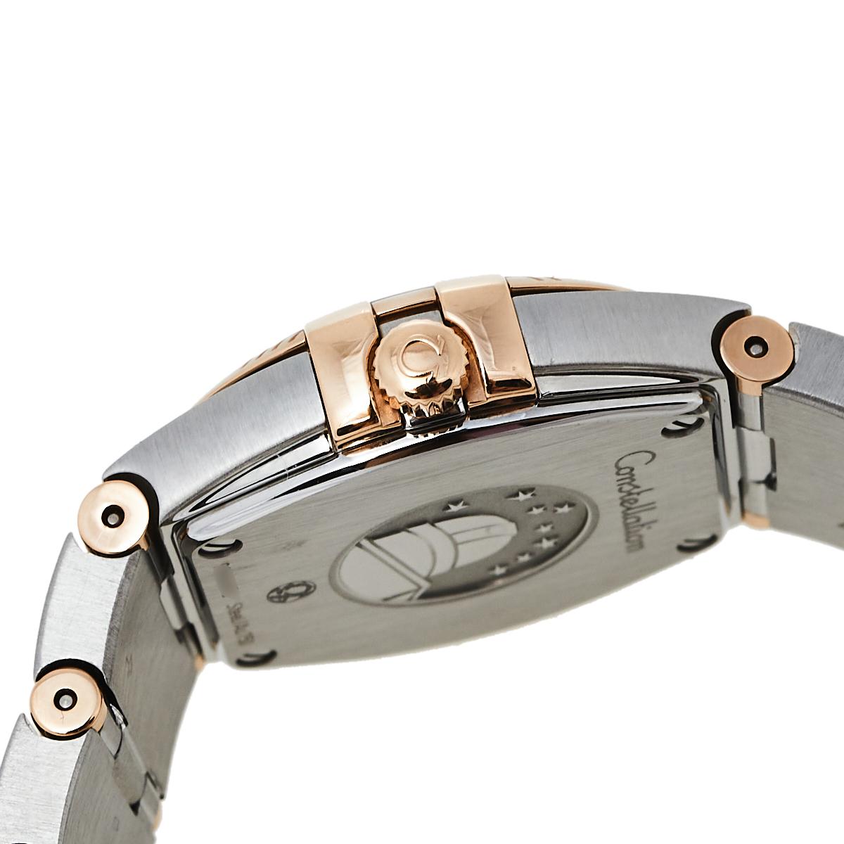 An icon from Omega, this Constellation Quartz watch for women is cast in stainless steel and 18 rose gold. It has Roman numerals engraved on the bezel and a magnificent Mother of Pearl dial that holds our gaze. Set on the round dial are two gold