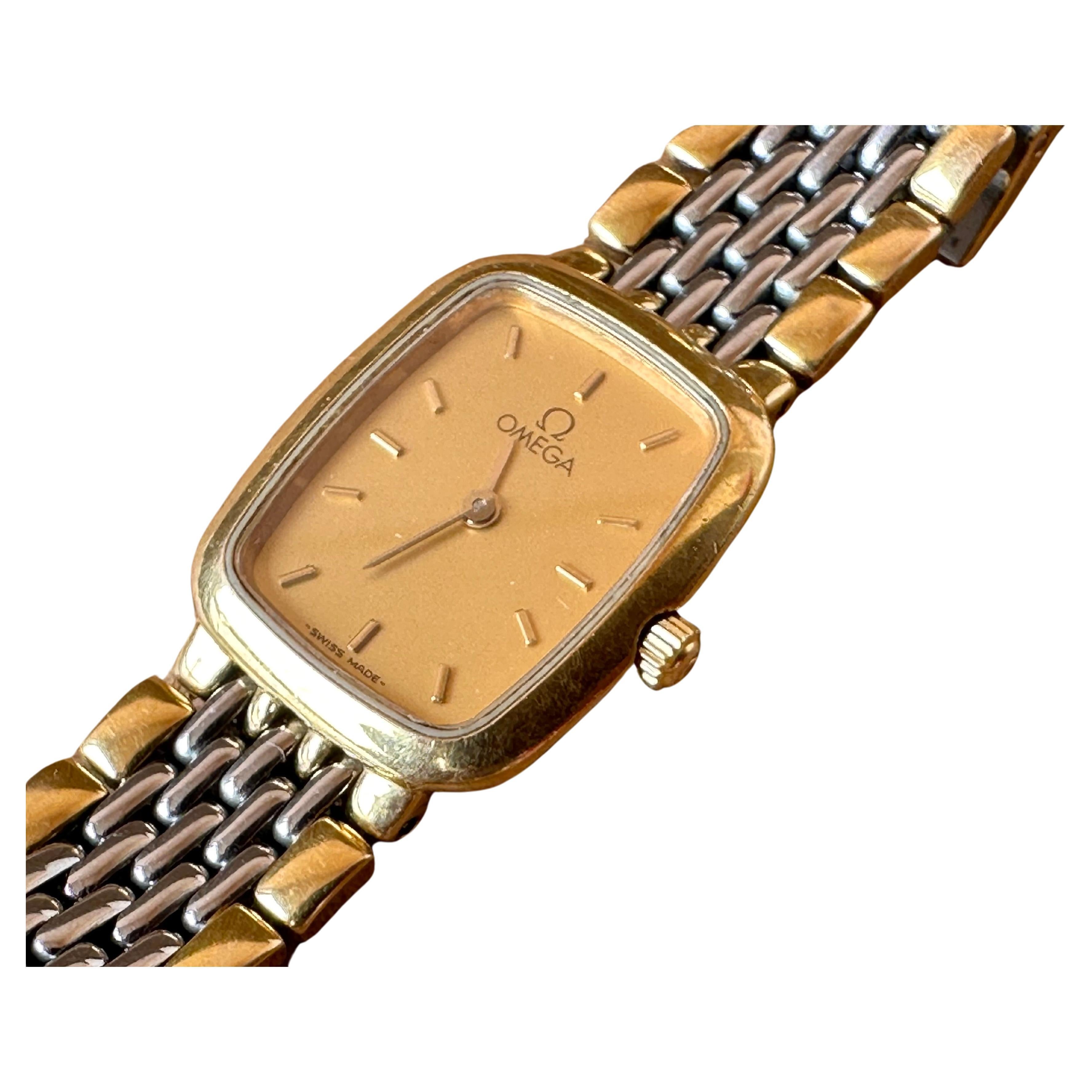 Brand: Omega

Model: De Ville

Reference Number: 53564103

Country Of Manufacture: Switzerland

Movement: Quartz

Case Material: Gold Plated Stainless steel

Measurements : Case width: 18 mm. (without crown) x 23mm

Band Type : Gold Plated &