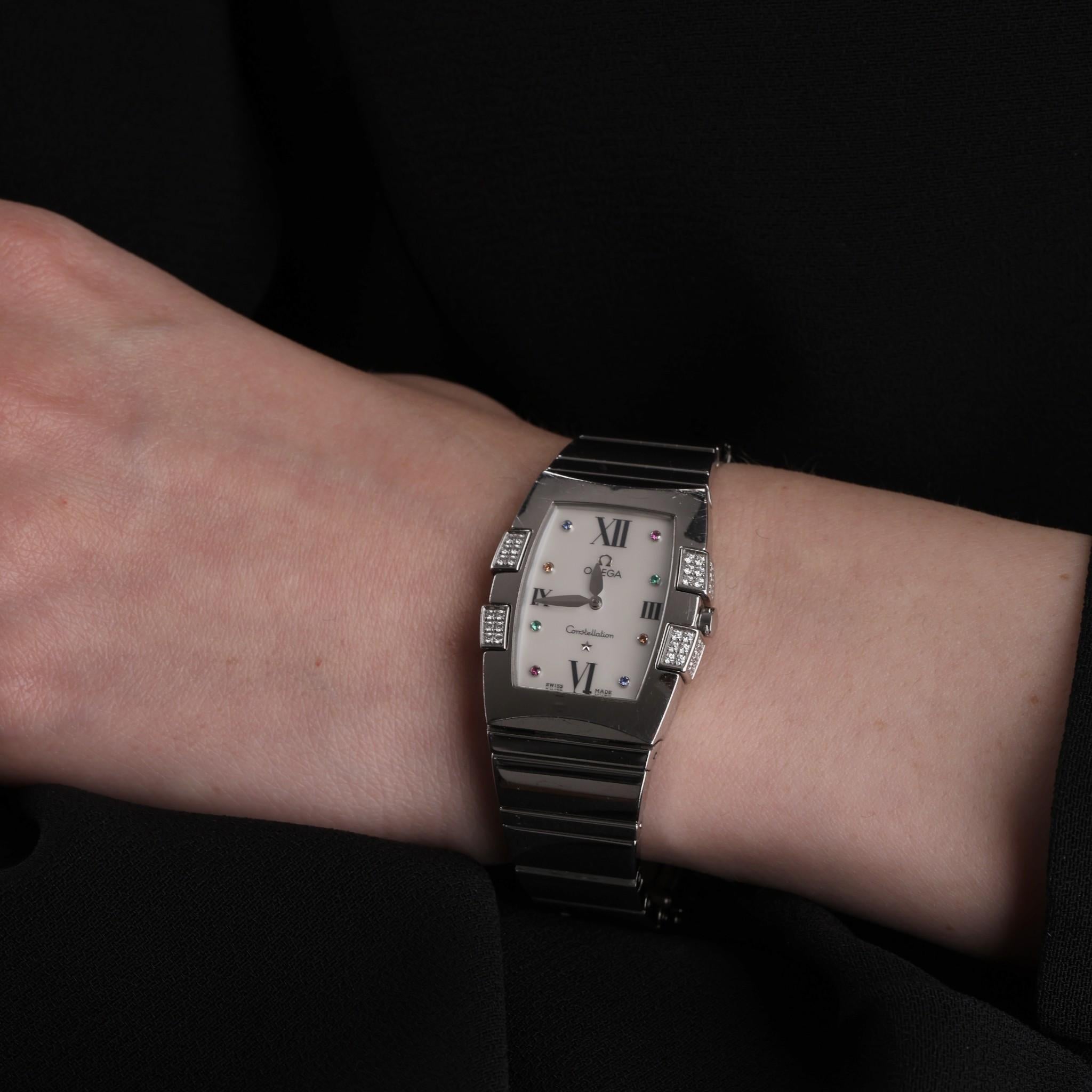Omega Quadrella Constellation Mother Of Pearl & Diamond Watch

The Constellation Quadrella model accentuates its Constellation heritage

with 48 brilliant white diamond claws.

Roman numerals to the white mother of pearl face and having 2 rubies, 2