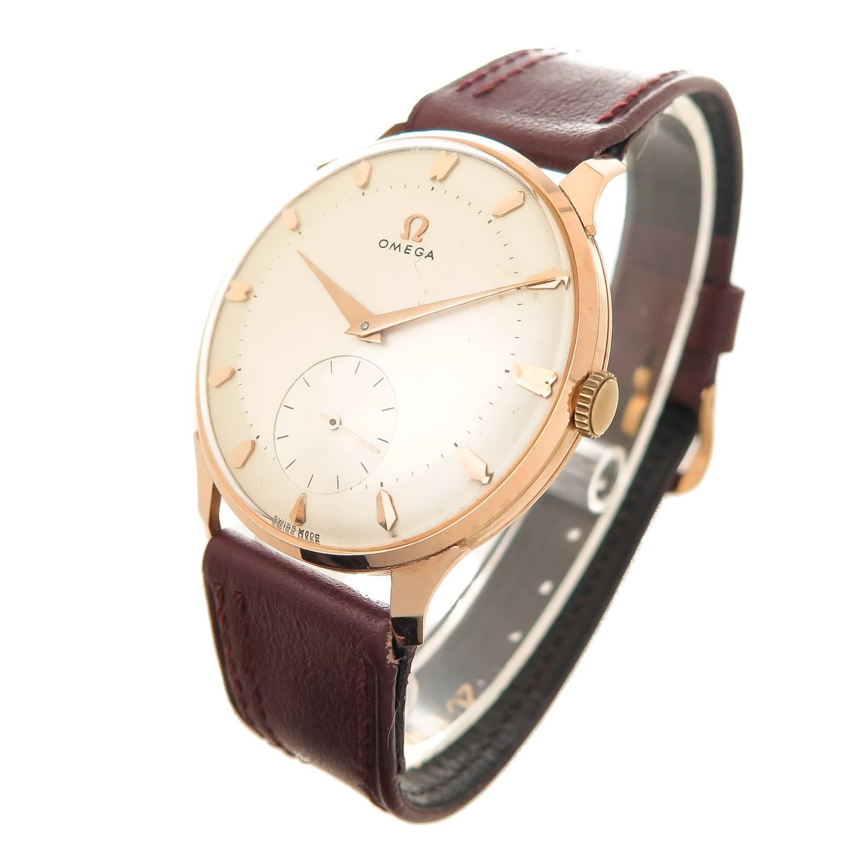 Circa 1940s Omega Wrist Watch, 37 M.M. 18K Rose Gold 3 piece Case, the case is unsigned and is correct and typical of Omega Watches of this period that were specifically made and cased for the South American Market. 17 Jewel caliber 267 Mechanical,