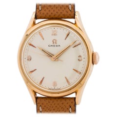 Omega Rose Gold Waffle Dial Manual Wind Dress Wristwatch, circa 1955