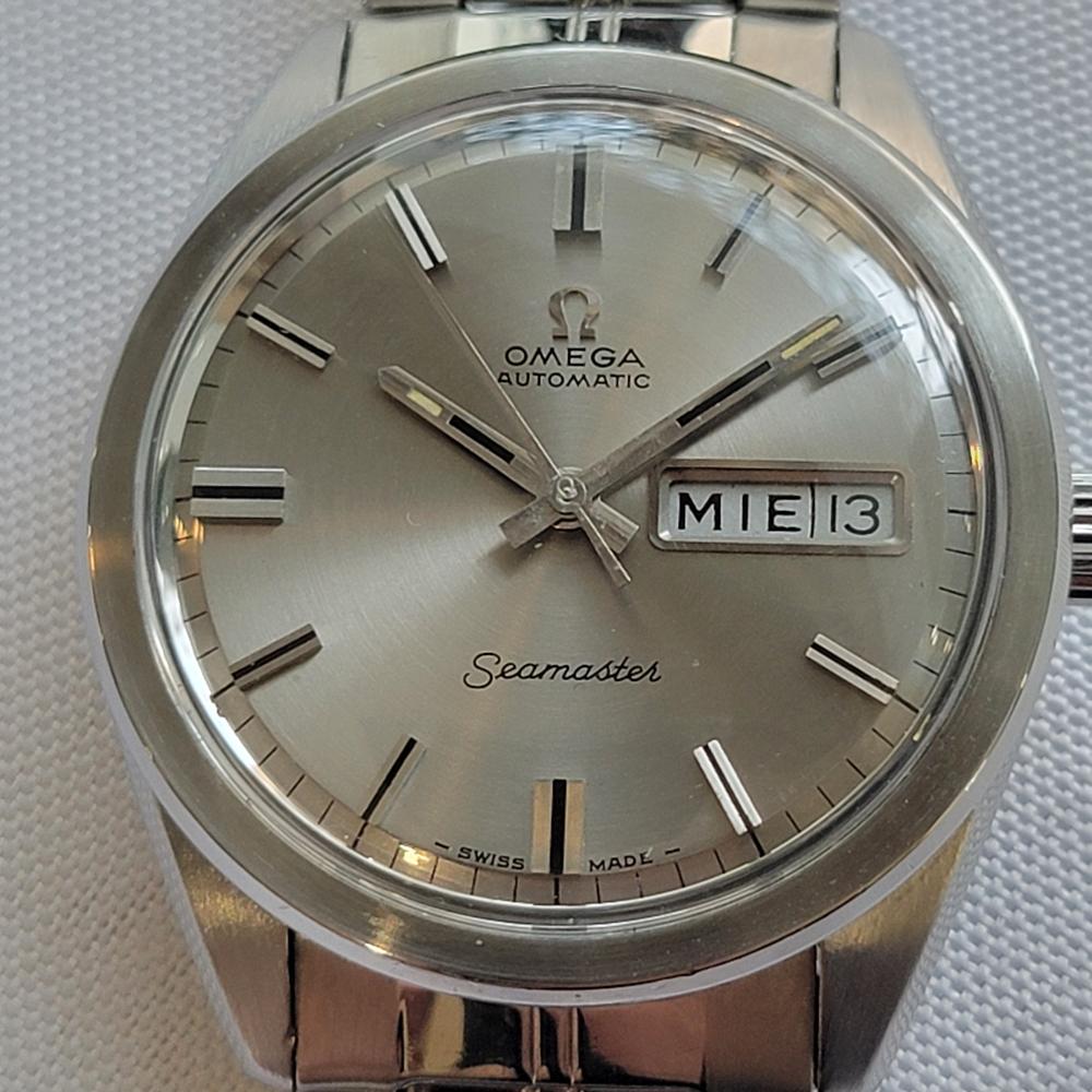 Timeless classic, Men's Omega Seamaster Ref 166 032 day date automatic, c.1967, all original, in excellent working condition. Verified authentic by a master watchmaker. Gorgeous Omega signed silver dial, day and date window at the 3 position, day in