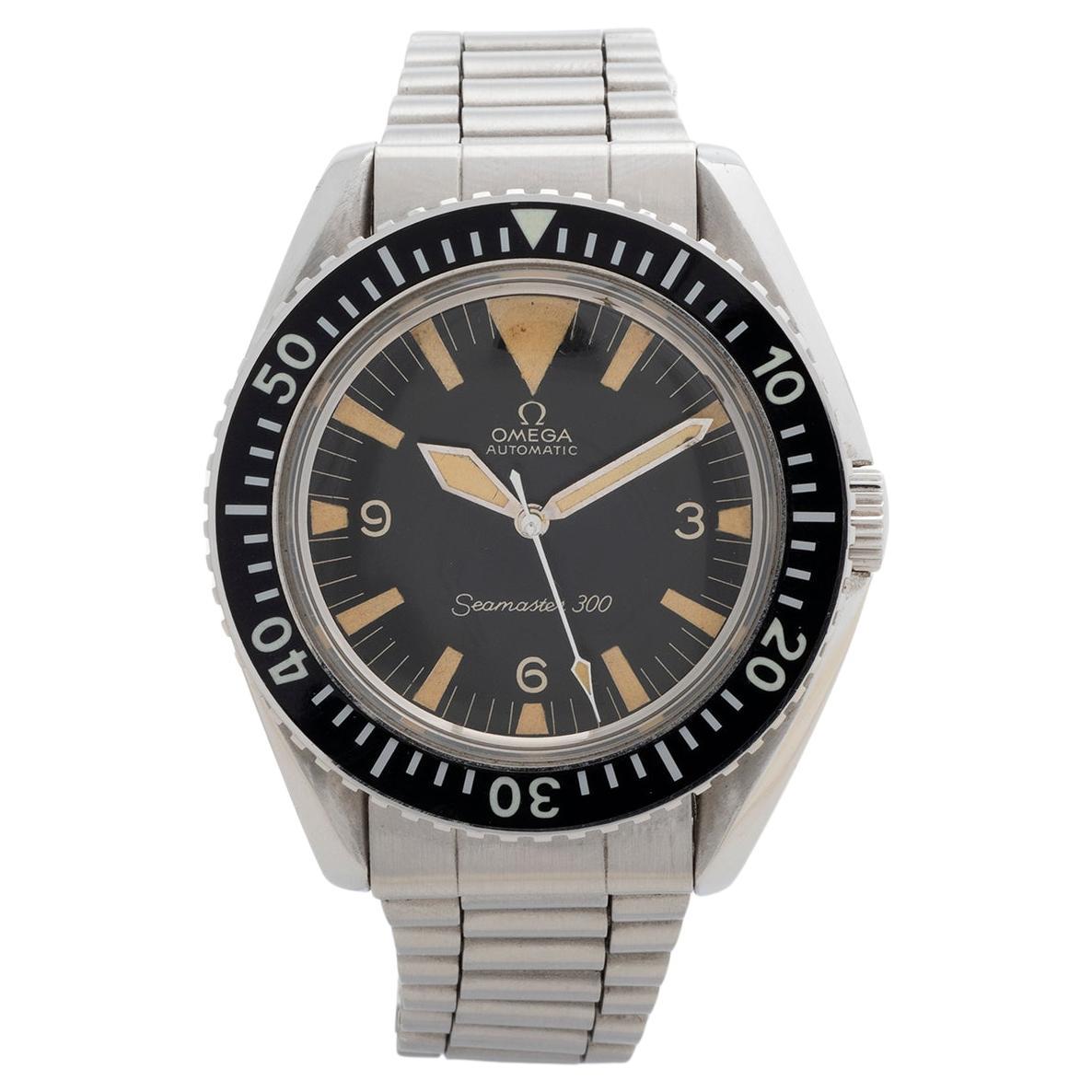 Our vintage and rare Omega Seamaster 300 automatic with 41mm stainless steel case, is a reference 165.024 with desirable big triangle dial with sword hands. Reference 165.024 is powered by a cal 552 automatic movement and this one is presented in