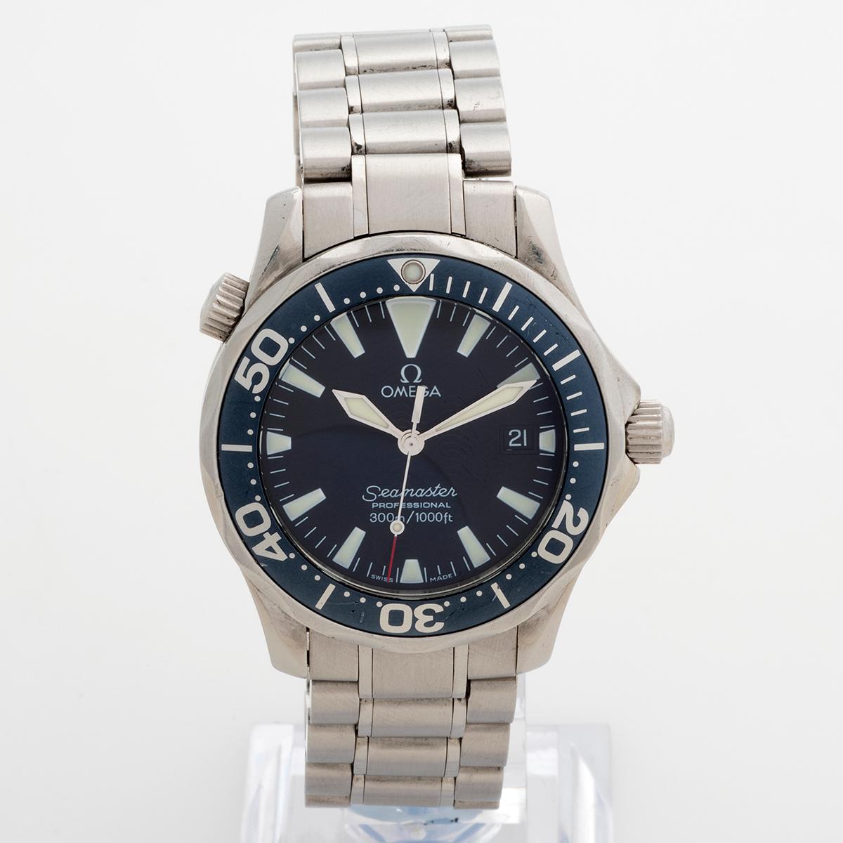 Our Omega Seamaster 300m Professional reference 2262.50.00 with quartz movement, features a 36mm stainless steel case and stainless steel bracelet with attractive black wave dial and lightly patinated black bezel insert which is developing a greyish