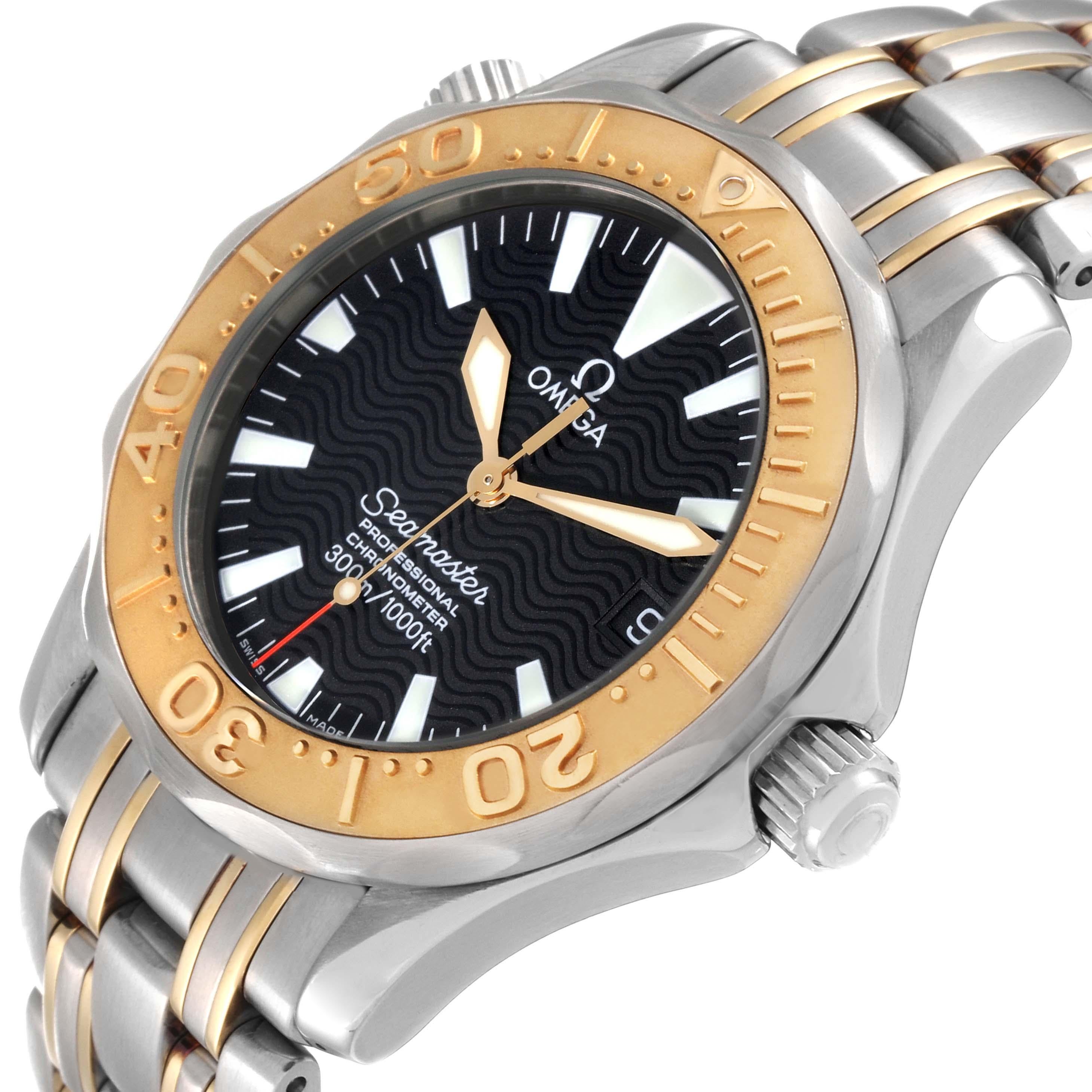 Omega Seamaster 36 Midsize Yellow Gold Steel Mens Watch 2453.50.00. Automatic self-winding movement. Caliber 1120. Stainless steel round case 36.25 mm in diameter. 18K yellow gold unidirectional rotating bezel. Scratch resistant sapphire crystal.