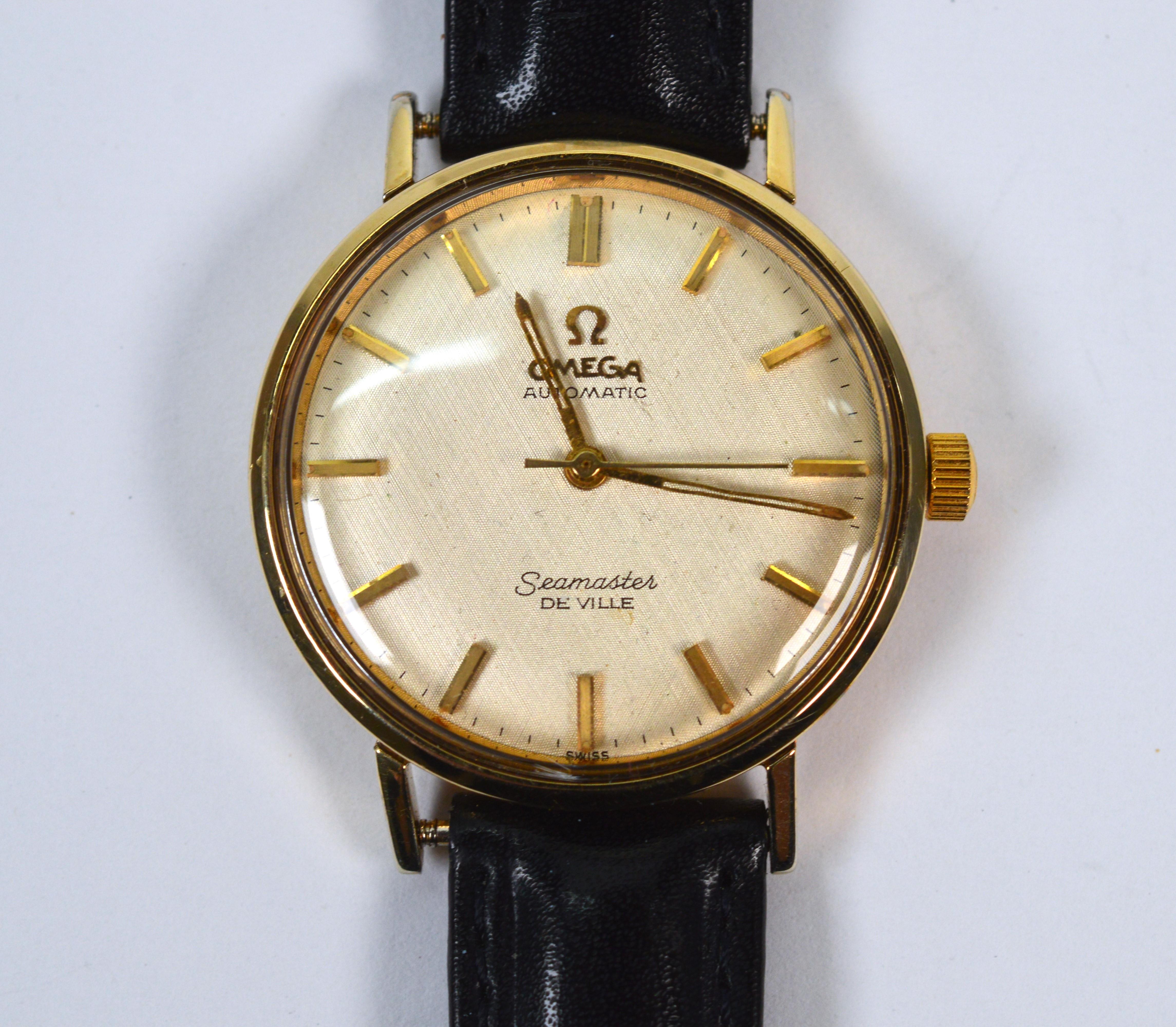 Always in style, a retro classic Omega Seamaster 563 De Ville Gold Filled Men's Wrist Watch. The height of popularity 1950-60s, this sleek 34mm timepiece presents clean lines and is light weight and comfortable to wear. The gold-filled round case