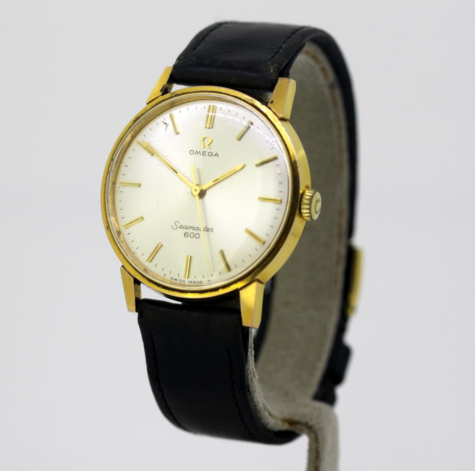 Omega Seamaster 600, vintage manual winding mens wristwatch, Circa 1960's

Gender: Men
Case Diameter : 34 mm
Movement: Manual Winding
Watchband Material: Omega Leather
Case material : Gold Plated
Display Type:	Analogue	
Dial: ( See Photos )
Year :
