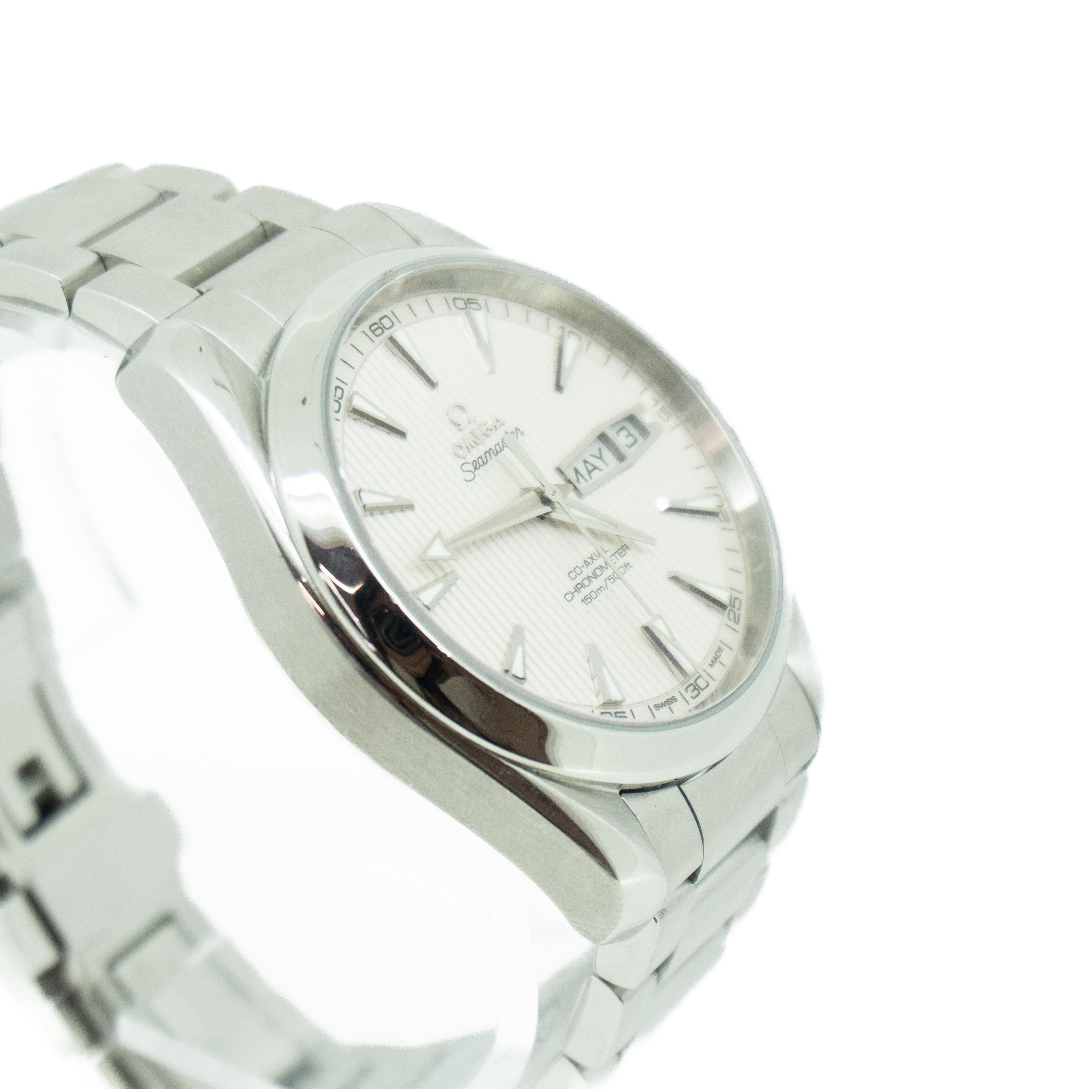 The Omega Seamaster Aqua Terra is a luxury watch with a classic and elegant design. It features a stainless steel case with a diameter of 43mm, a white dial with stick markers and a date window at the 3 o'clock position. The watch is powered by an