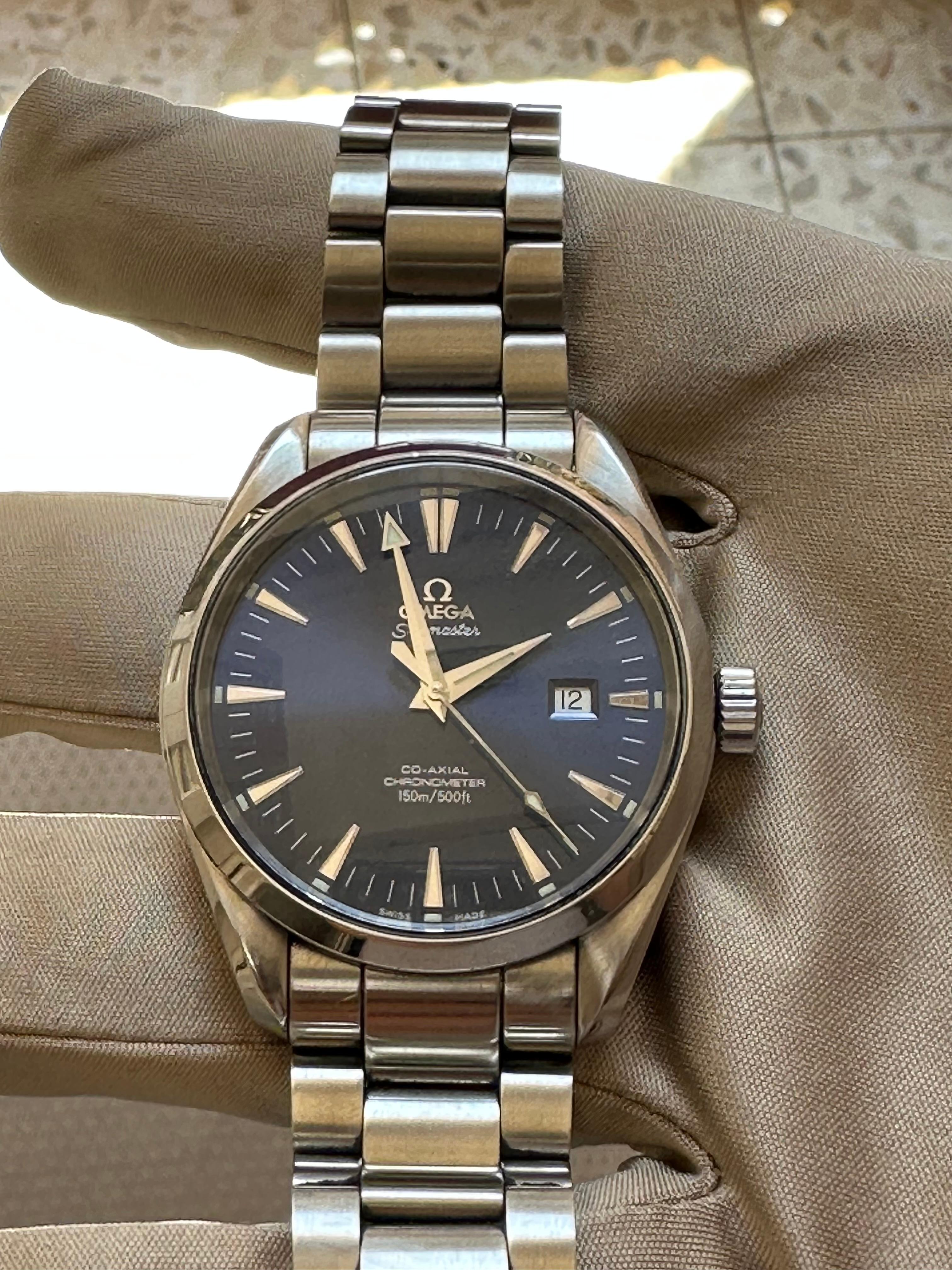 Brand: Omega

Model: Seamaster Aqua Terra Co-Axial Escapement

Country Of Manufacture: Switzerland

Movement: Automatic

Case Material: Stainless steel

Measurements : Case width: 42 mm. (without crown)

Band Type : Stainless steel

Band Condition :