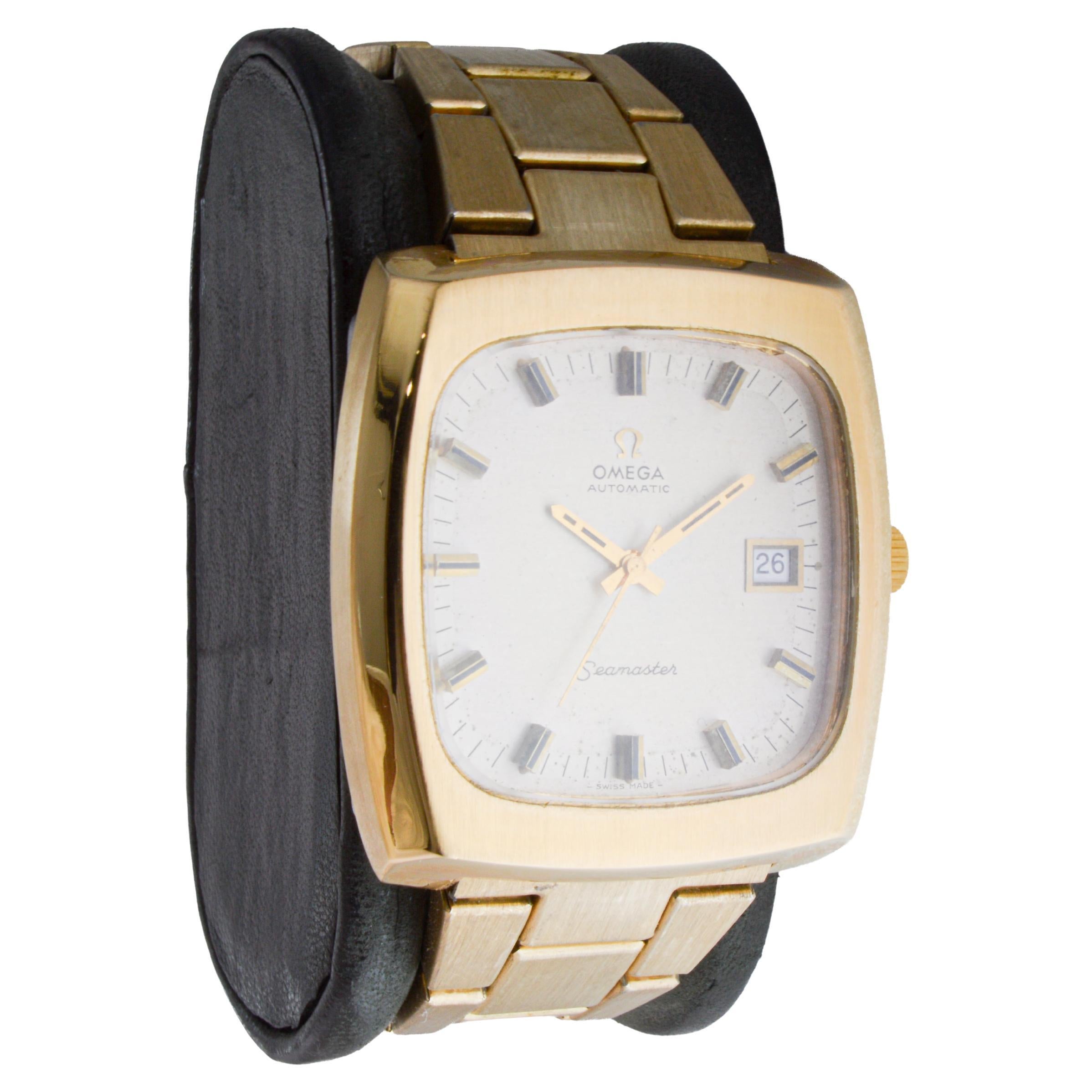 FACTORY / HOUSE: Omega Watch Company
STYLE / REFERENCE: Modernist / Seamaster
METAL / MATERIAL: Yellow Gold Filled 
CIRCA / YEAR: 1970's
DIMENSIONS / SIZE: Length 40mm X Width 38mm
MOVEMENT / CALIBER: Automatic Winding / 25 Jewels / Caliber 1012