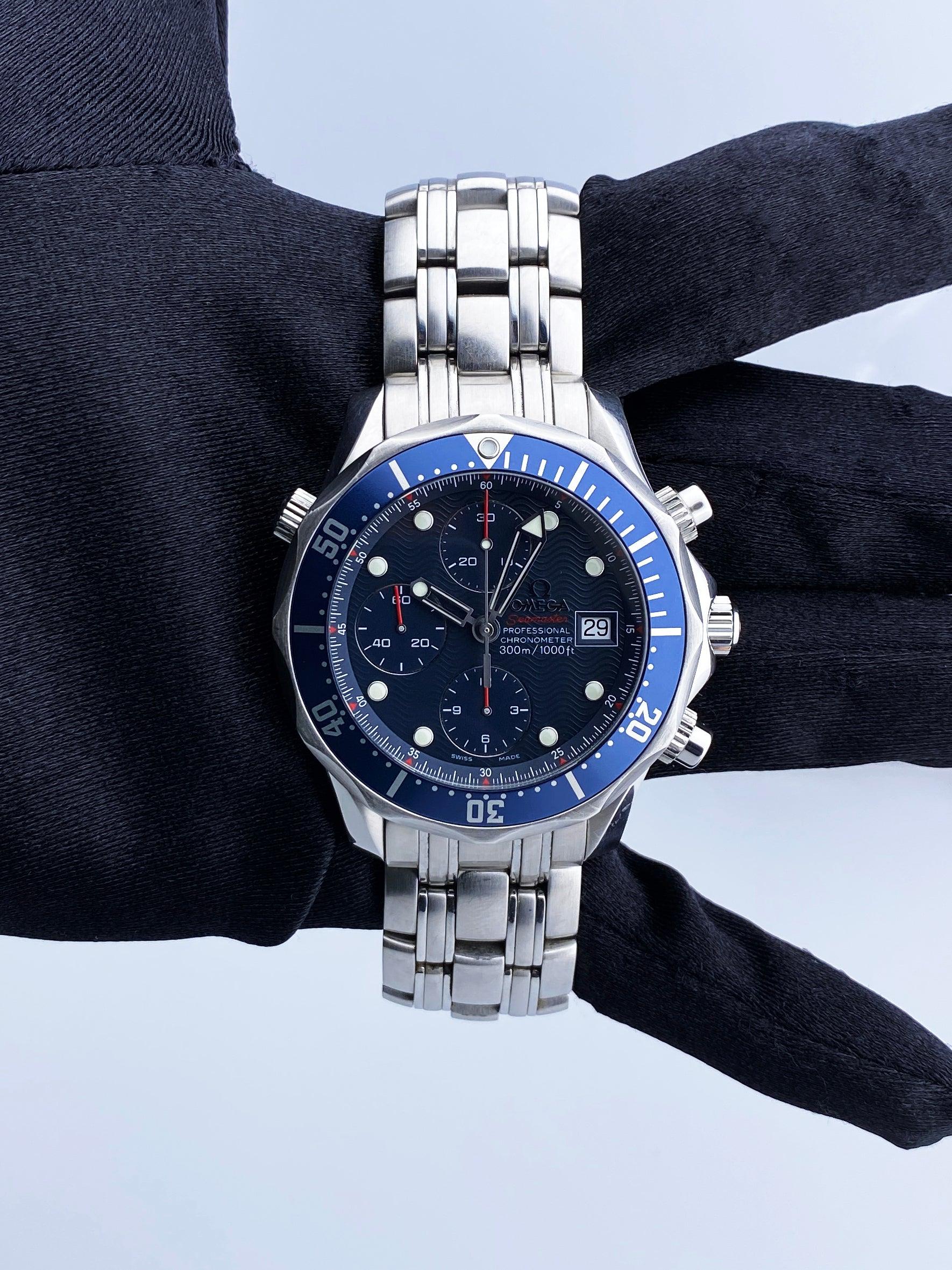 Omega Seamaster Professional Mens Watch. 42mm stainless steel case with stainless steel unidirectional rotating bezel with blue bezel insert. Blue wave dial with luminous steel hands and dot hour markers. Date display at the 3 o'clock position.