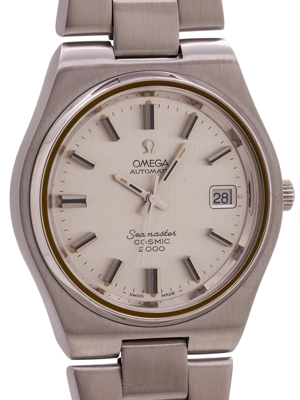 
Omega Seamaster Cosmic 2000, Ref. 166.135. Serial # 33 Million, circa 1971. Featuring a flat and wide modernist case, measuring 38 x 44mm, with mineral glass crystal, signed Omega crown and case back Hippocampus logo. With lovely original silver
