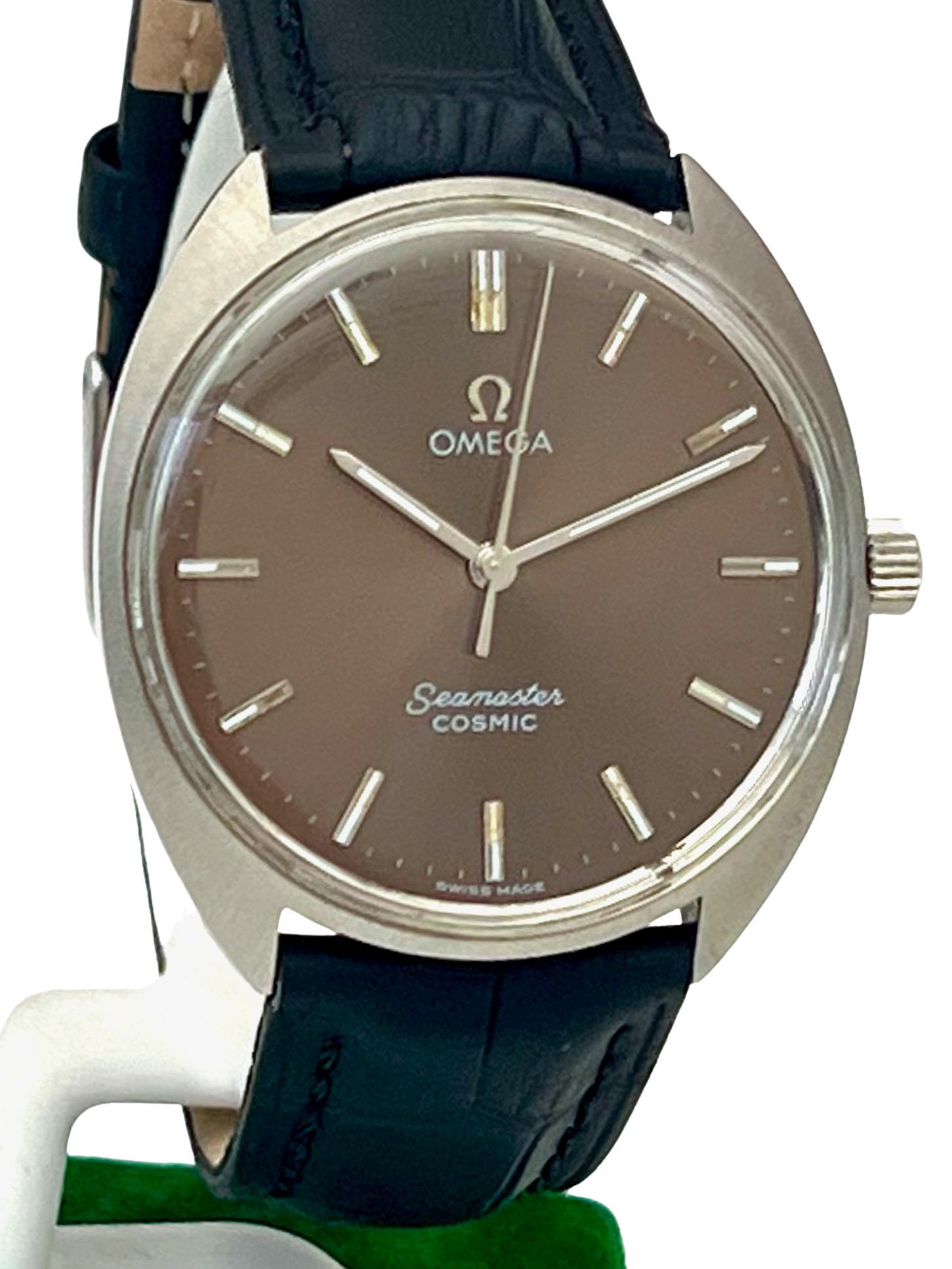 Classic vintage Omega Seamaster Cosmic stainless steel one-piece monocoque ‘C’ shaped case, with brushed sunburst finish, streamlined case back signed ‘Seamaster Waterproof, 135017 - Tool 107’ and with engraved hippocampus.

Featuring a rich brown