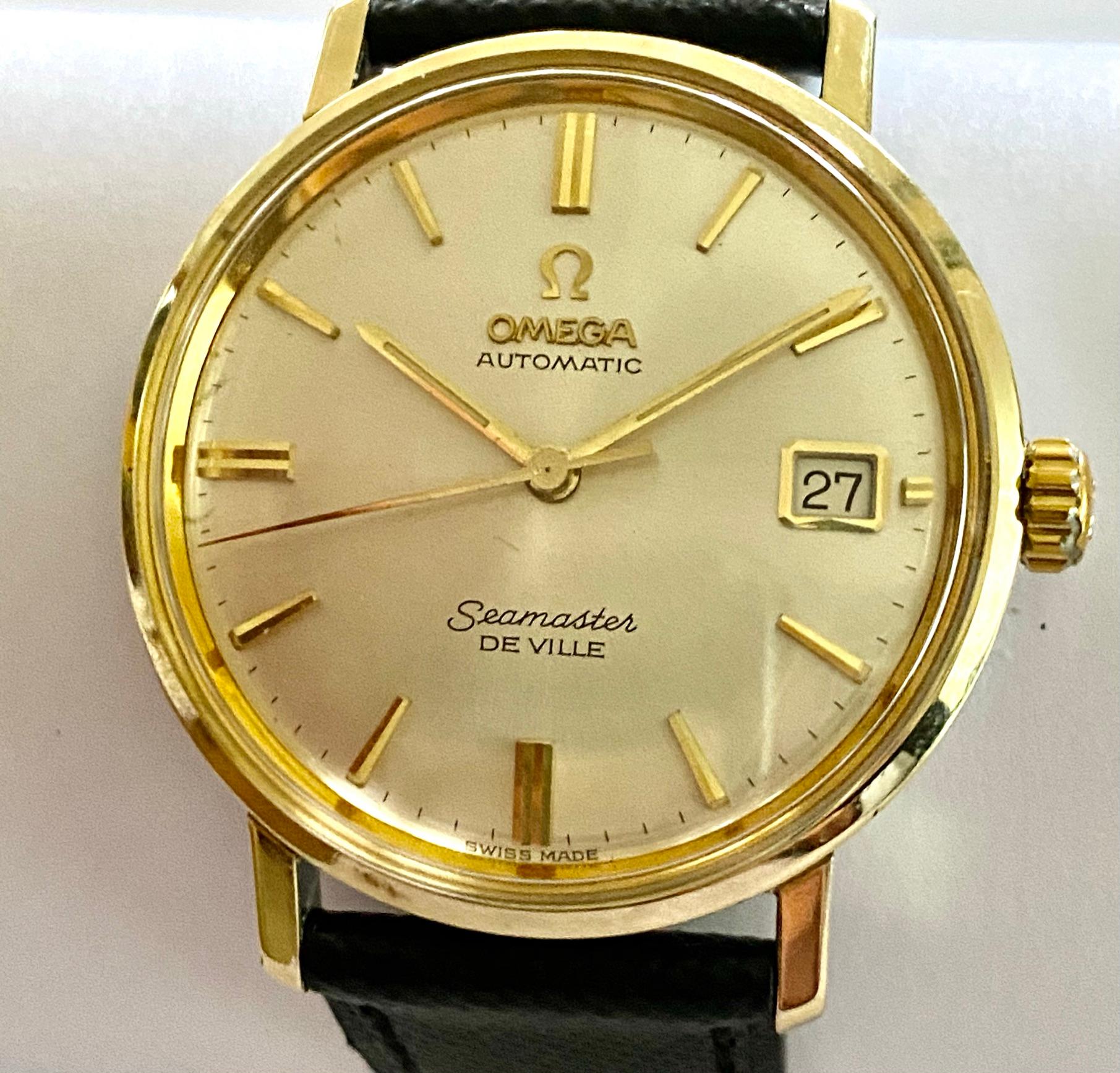 One (1) Omega Automatic Seamaster De Ville  1964,   model number: CD 166.020 
Caliber: 562 Omega  with date.  diameter: 34 mm   High: 10 mm, lengths of strap:   110 mm & 70 mm
Silvered Dial, Polished and riveted gold hour markers, Gold baton hands