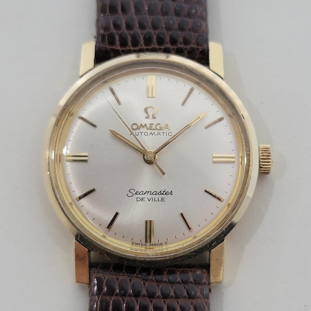 Lujo clásico, Omega Seamaster DeVille automático de oro macizo de 14 quilates para caballero, c.1968, en excelente estado de funcionamiento. Verificado auténtico por un maestro relojero. Preciosa esfera plateada firmada por Omega, índices de bastón