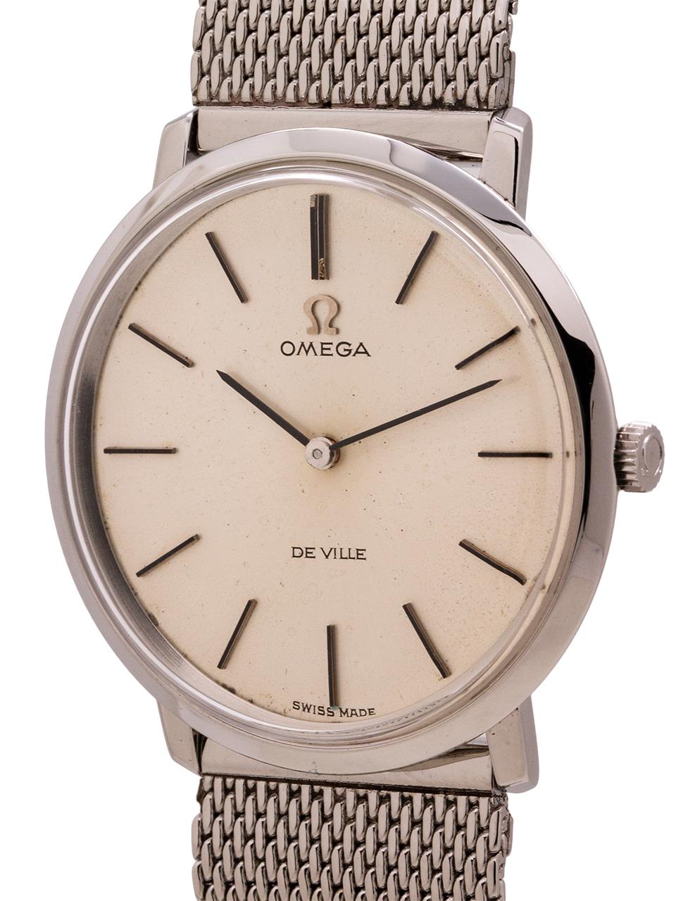 
Classic mid century design vintage man’s Omega stainless steel Deville ref # 111.077 circa 1969. Featuring a sleek and slim 33mm case with snap case back, acrylic crystal, and original matte silver dial with applied black indexes and OMEGA logo,