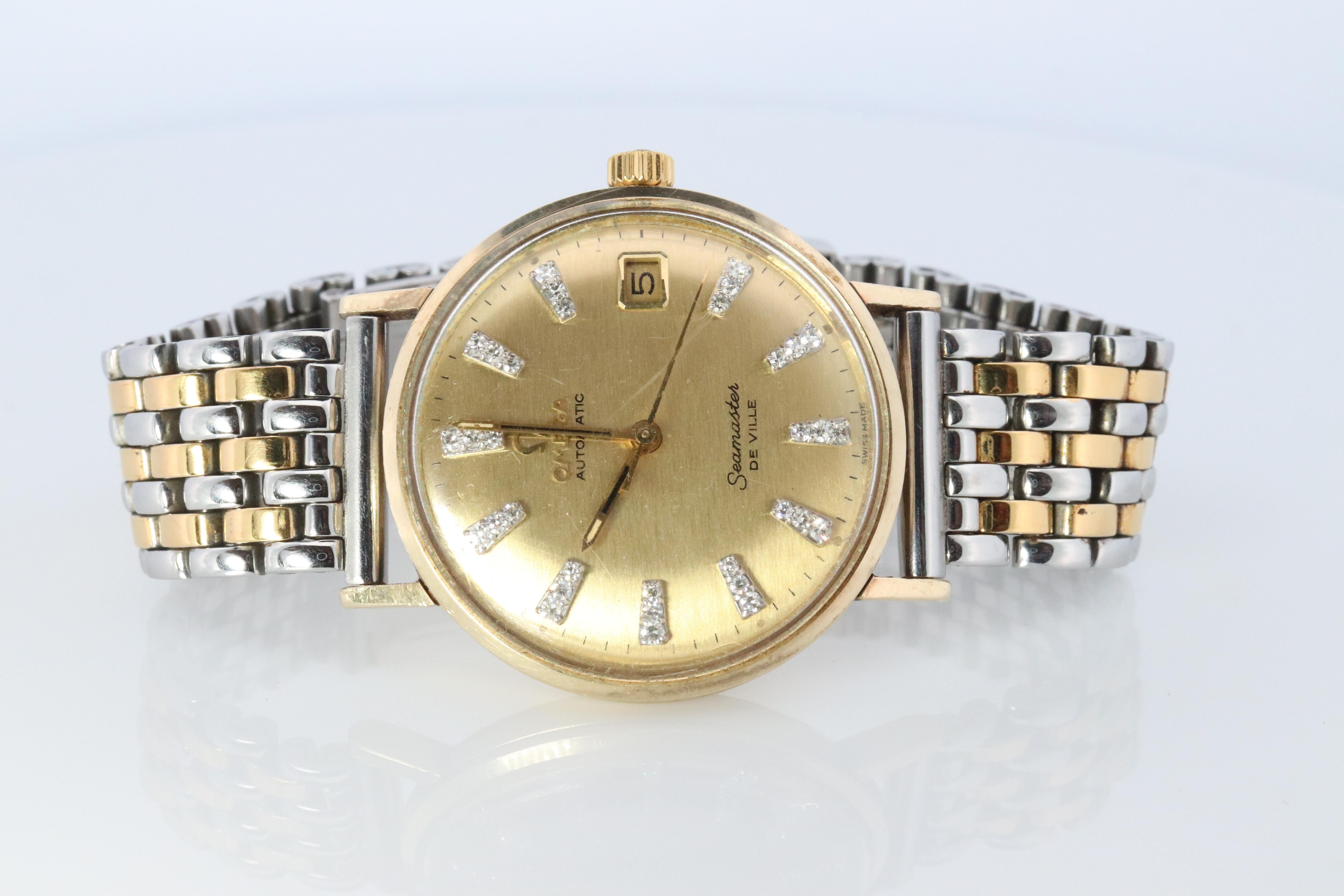 Vintage Omega Automatic Diamond Seamaster De Ville.

14k Gelbgold  Fall. (Markiert unter dem Band)

Diamant-Stundenmarker

Zustand: Funktioniert und hält die Zeit. Ausgezeichneter Zustand für das Alter.



Einzelheiten:
34mm x 11,5mm Gehäuse
5mm