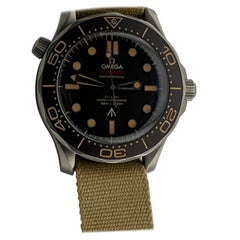 Omega Seamaster No Time to Die 007 210.90.42.20.01.001 42mm Brown Dial Box Paper