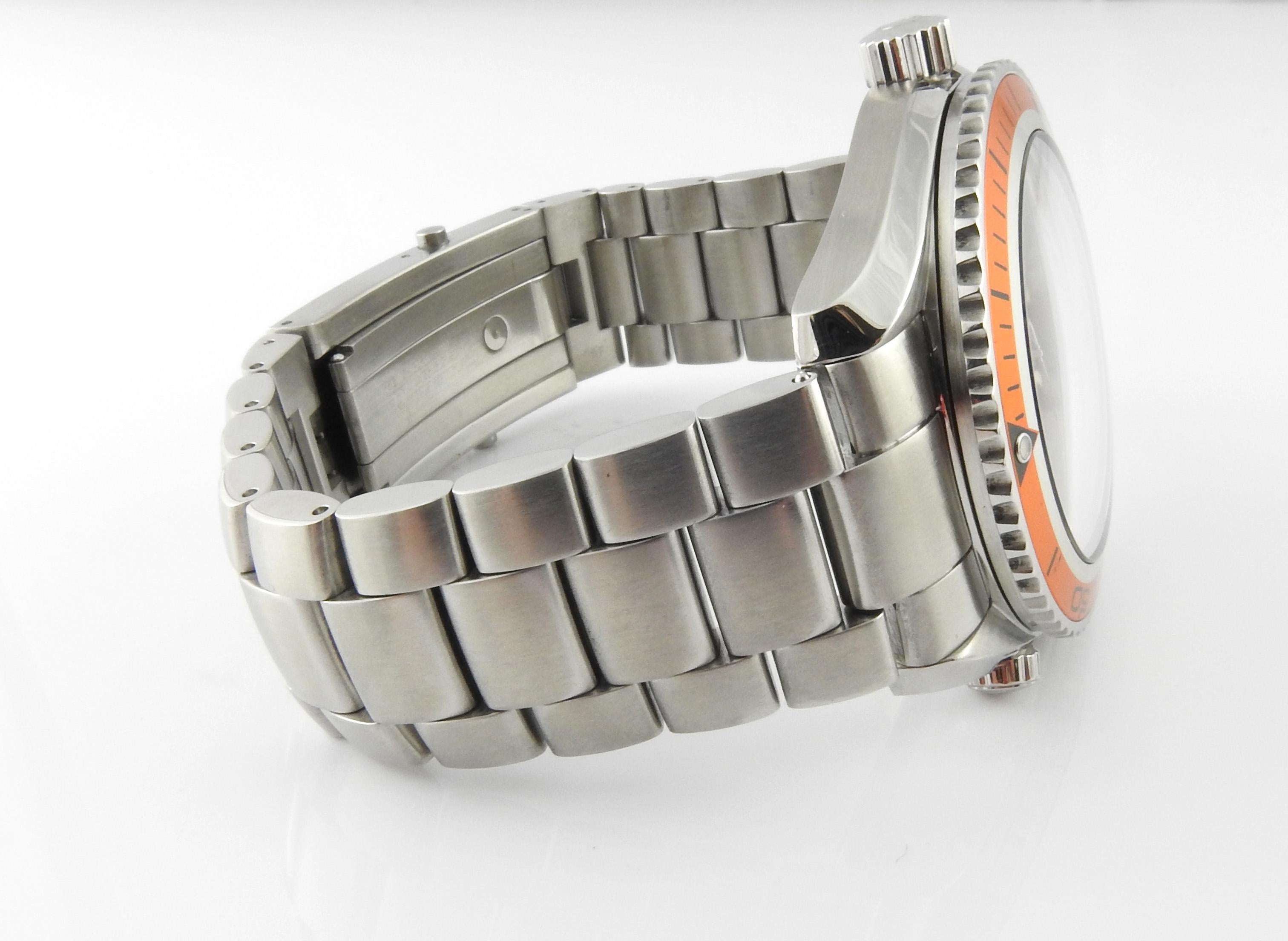 Omega Seamaster Planet Ocean Men's Watch

Model: 2209.5
Serial: 81062357

42mm watch case

Black Dial

Orange Bezel

White luminescent markers and numbers at 6, 9, 12

Date

Automatic Movement

Very good preowned condition. No scratches, dings or