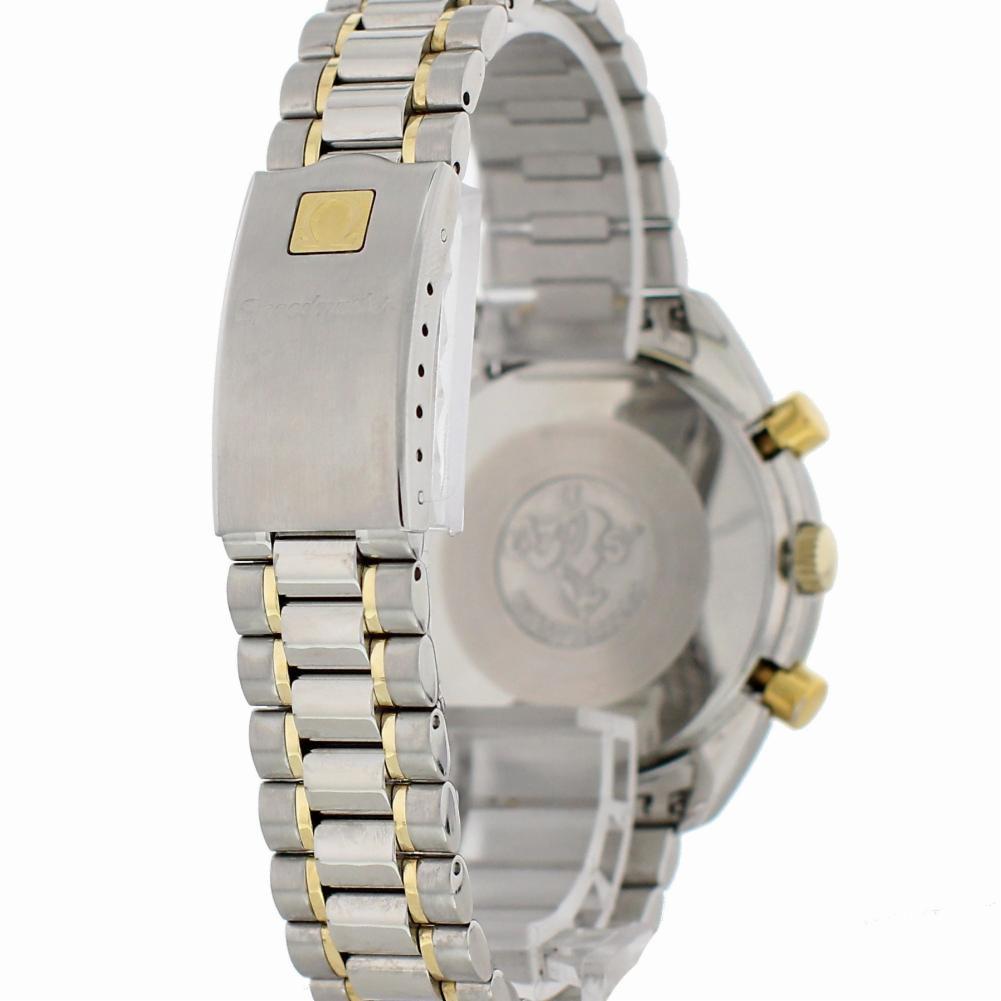 Omega Speedmaster  Reference #:3310.20.00. Omega Speedmaster Chronograph 3310.20.00 Mens Watch. 39mm stainless steel case with gold tachymeter bezel with black bezel insert. White dial with Luminous gold hands and indexes. Three chronograph